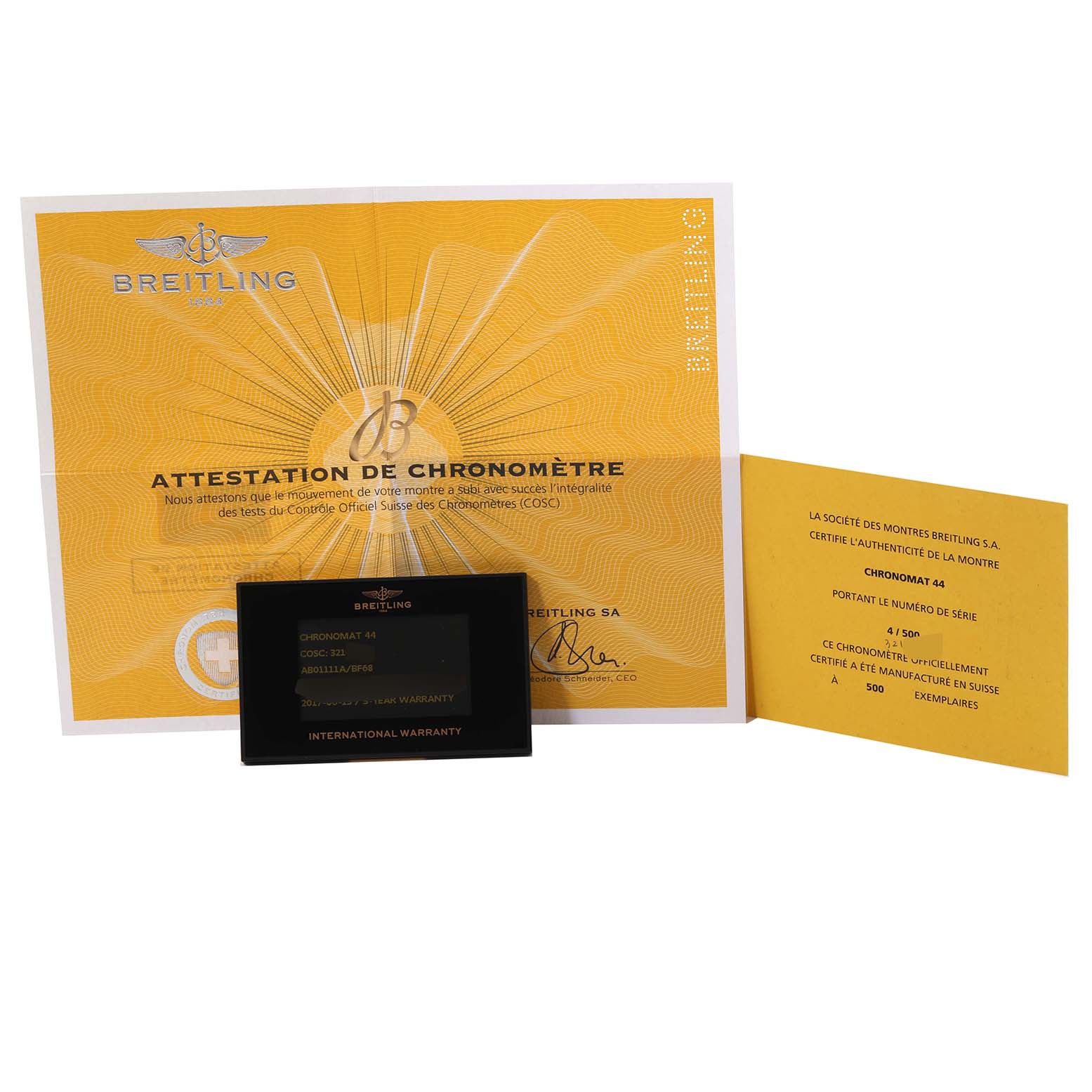 This image shows the warranty card and certificates for the Breitling Limited Series Chronomat 44 model.