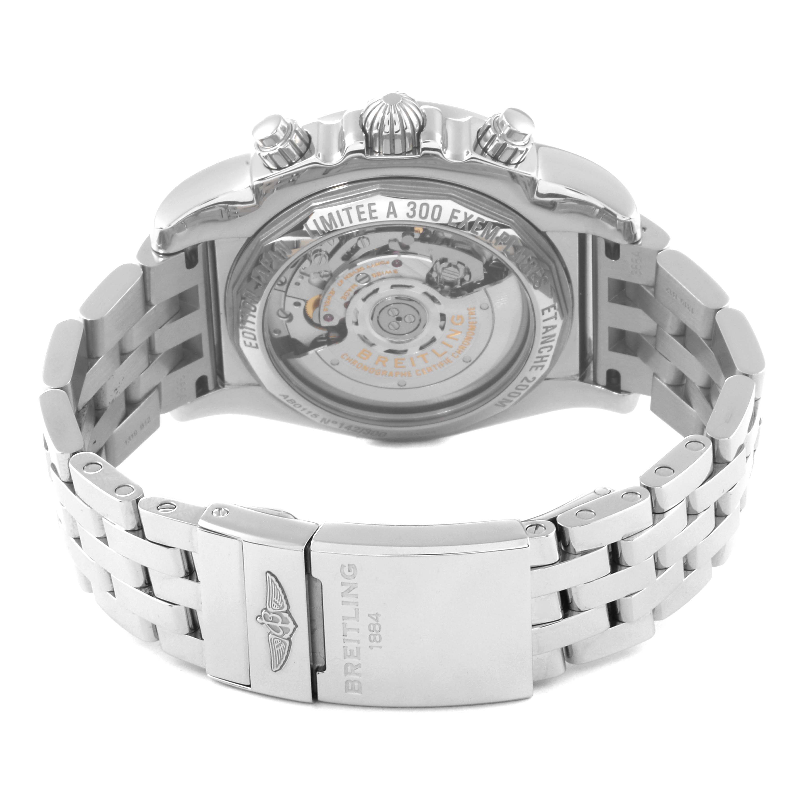 The image shows the back and bracelet of a Breitling Limited Series watch, focusing on its transparent case back and stainless steel clasp.