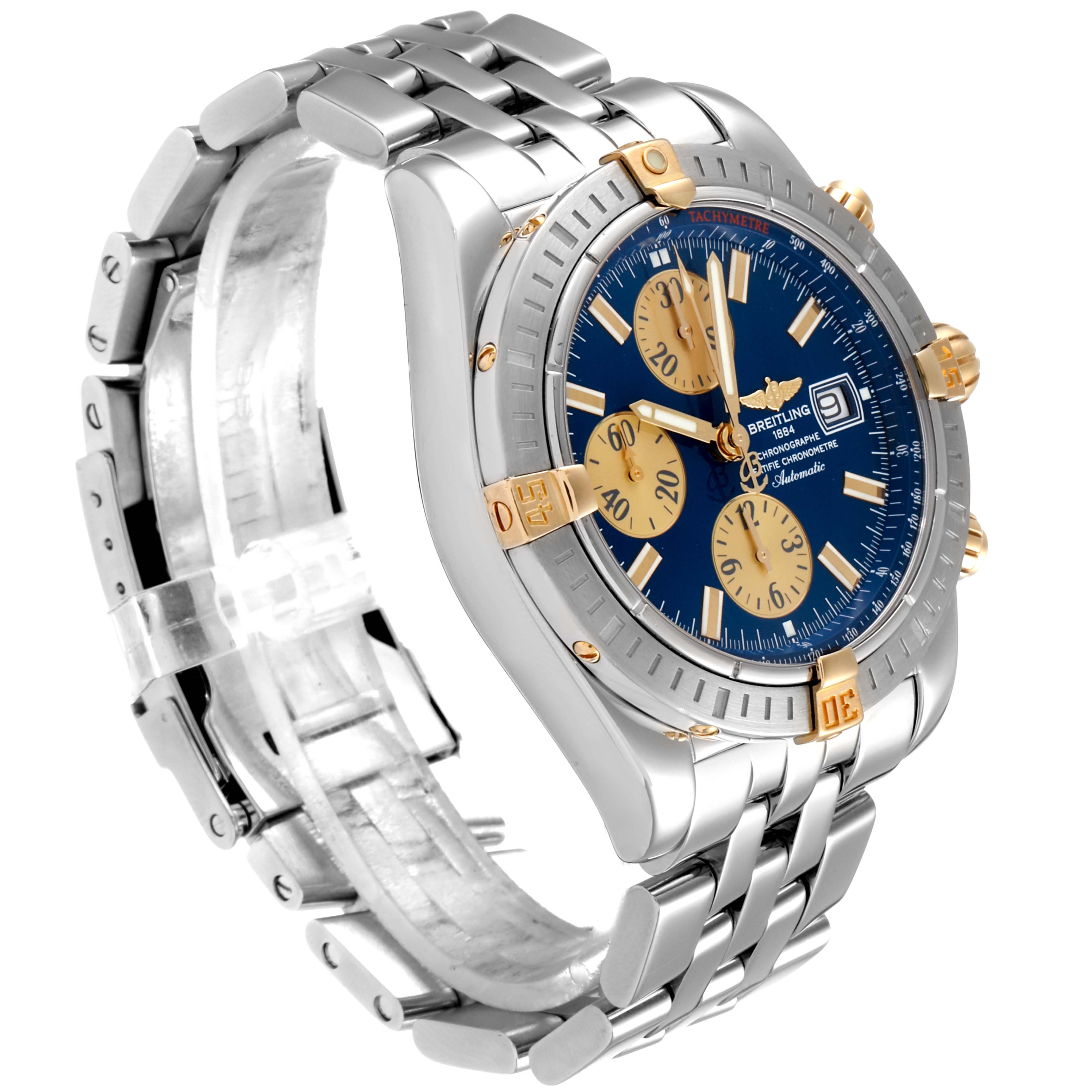 The image shows a Breitling Chronomat B13356 Men's Steel and Gold (two tone) Blue Dial B13356 Men's Steel and Gold (two tone) Blue Dial watch at a three-quarter angle, highlighting its face, bezel, and stainless steel bracelet.