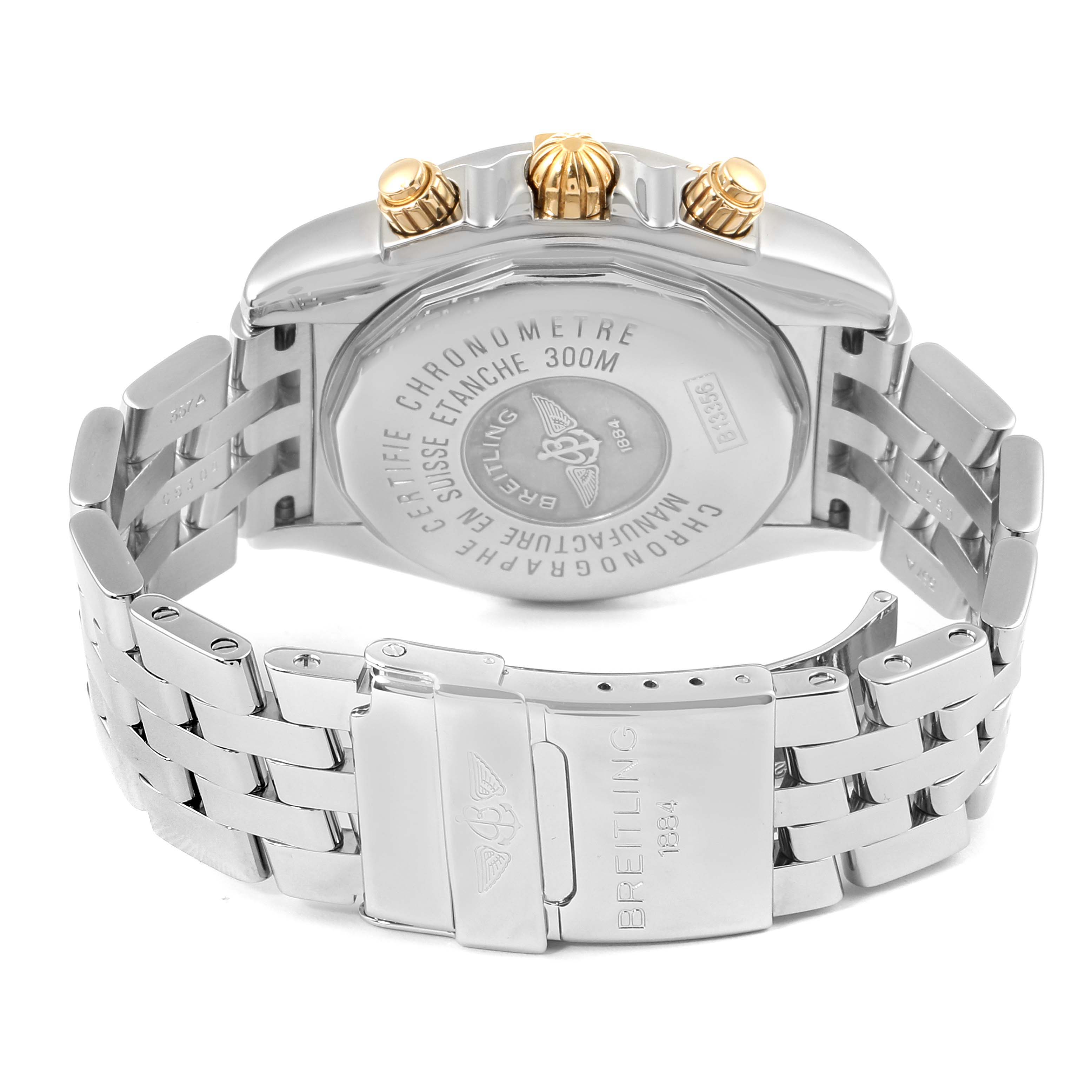 The image shows the back view of a Breitling Chronomat B13356 Men's Steel and Gold (two tone) Blue Dial B13356 Men's Steel and Gold (two tone) Blue Dial watch, focusing on the case back, chronograph buttons, and stainless steel bracelet.