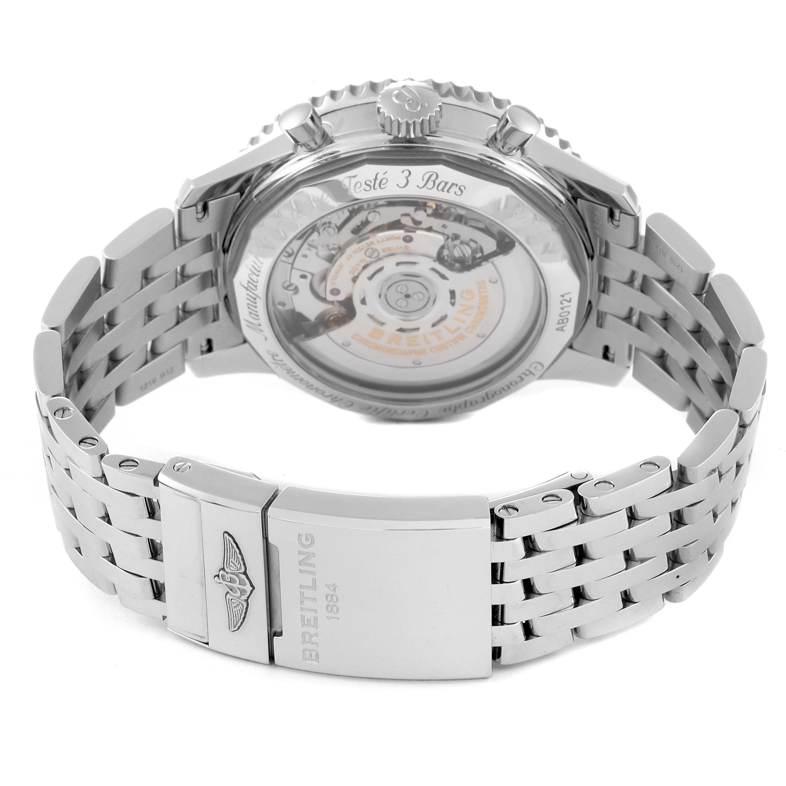 The image shows the back view of a Breitling Navitimer AB0121 Men
s Stainless Steel Mother of Pearl Dial AB0121 Men
s Stainless Steel Mother of Pearl Dial watch, displaying its intricate mechanism and stainless steel bracelet.