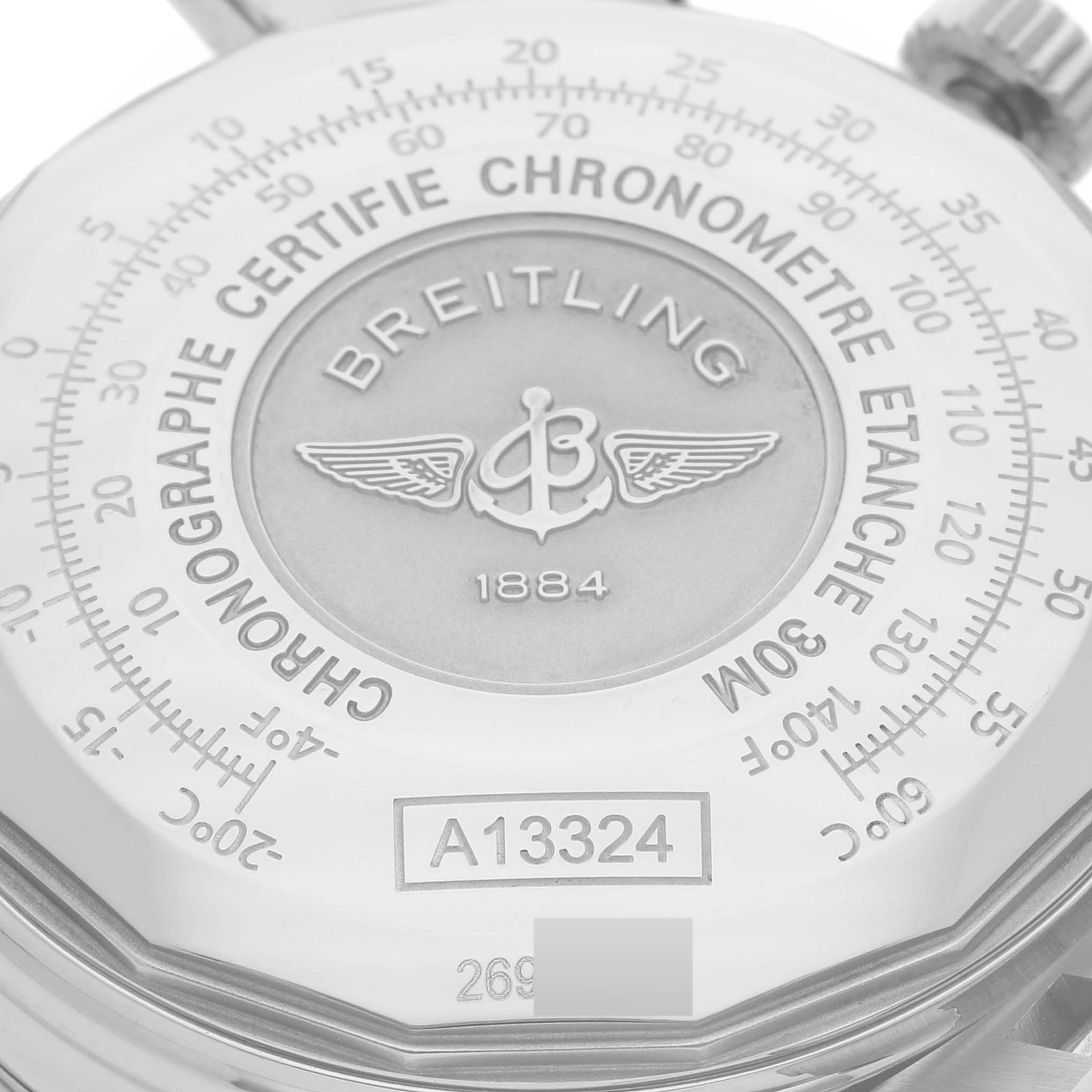 This image shows the backside of the Breitling Navitimer A1332412/BD49 Men
s Stainless Steel Black Dial A1332412/BD49 Men
s Stainless Steel Black Dial watch, featuring engraved text and the model number.
