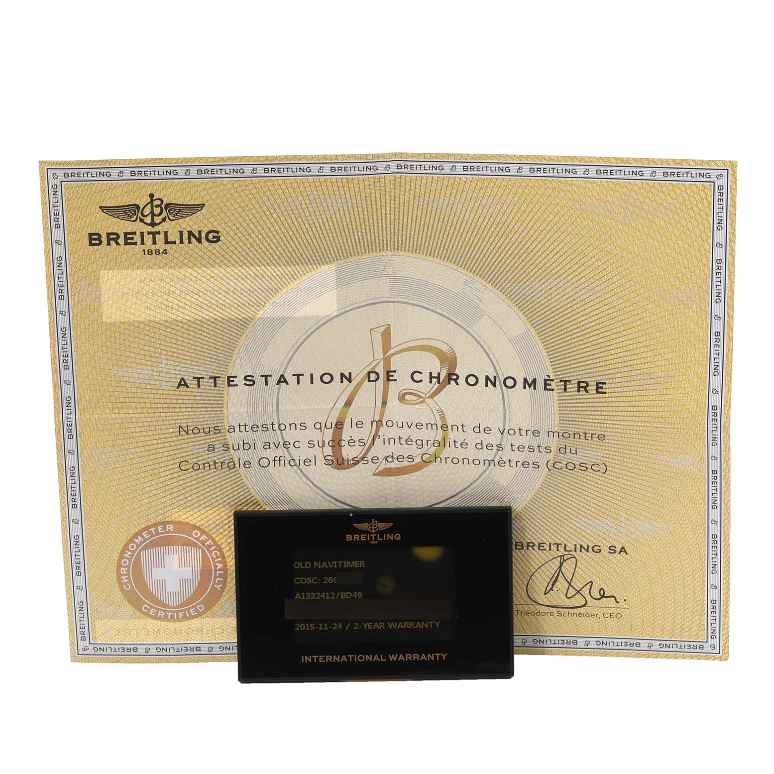 The image shows the Breitling Navitimer A1332412/BD49 Men
s Stainless Steel Black Dial A1332412/BD49 Men
s Stainless Steel Black Dial
s chronometer certificate and international warranty card displayed directly from a front angle.