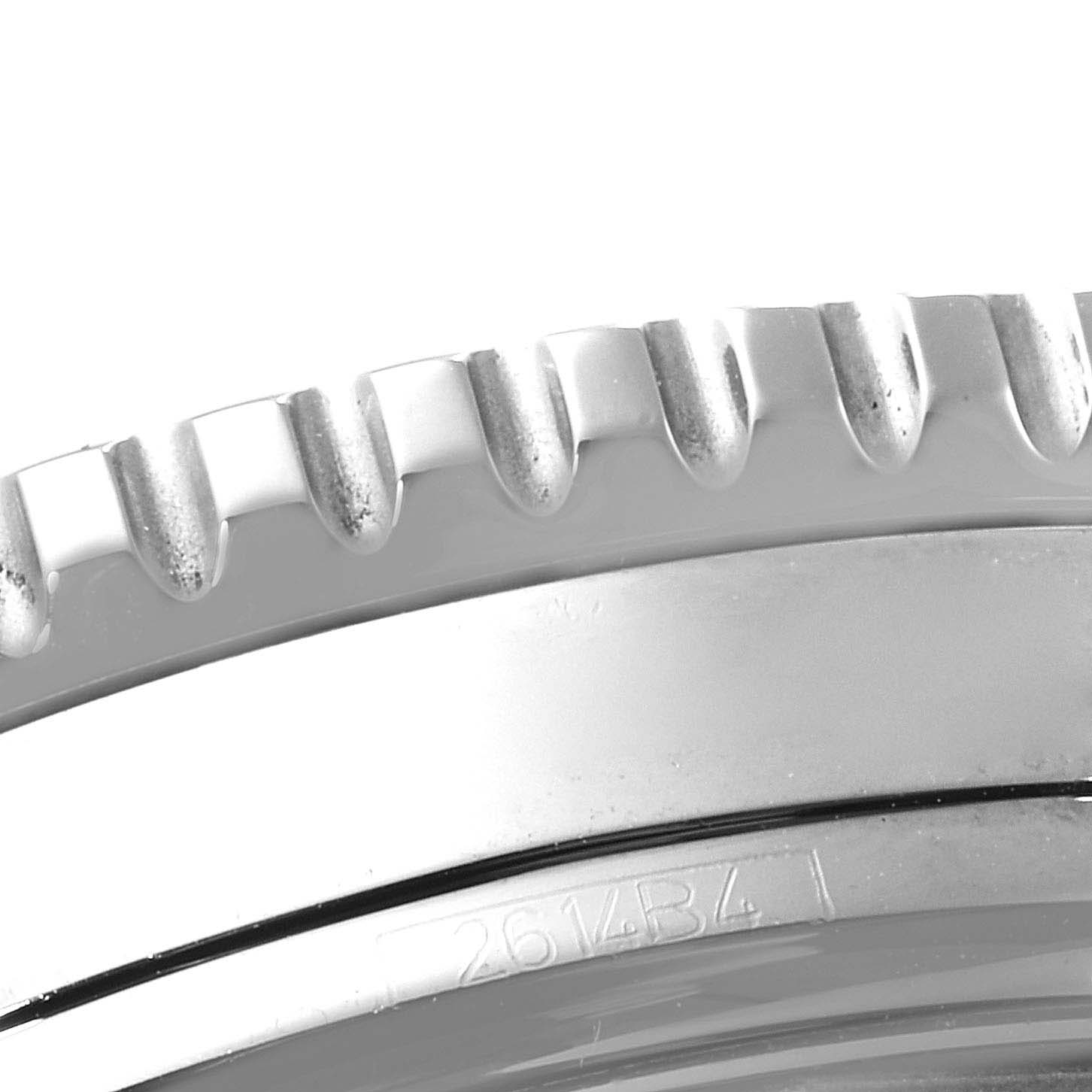 The image shows a close-up of the bezel edge and part of the case back of the Breitling Navitimer A13324 Men's Stainless Steel Black Dial A13324 Men's Stainless Steel Black Dial watch model.