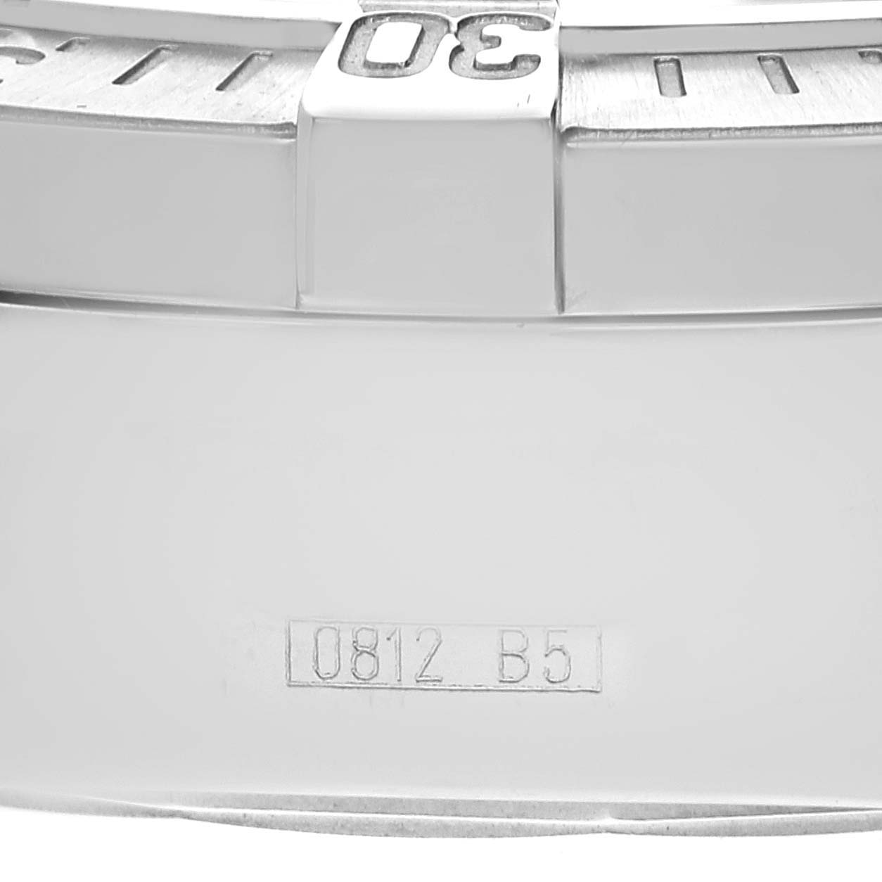 The image shows a close-up of the bezel and part of the case of a Breitling Superocean A13340 Men's Stainless Steel Black Dial A13340 Men's Stainless Steel Black Dial watch, highlighting the 30-minute marker.