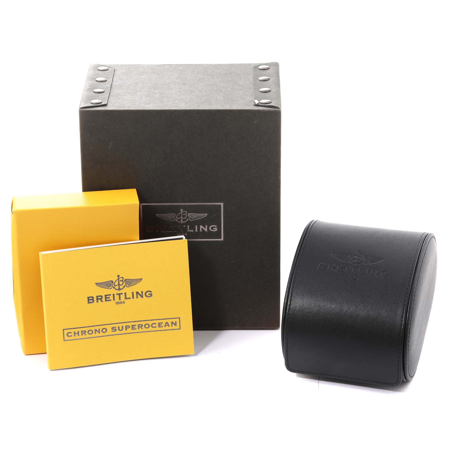 The image shows the packaging and accessories of a Breitling Superocean A13340 Men's Stainless Steel Black Dial A13340 Men's Stainless Steel Black Dial model watch, including boxes and a travel case.