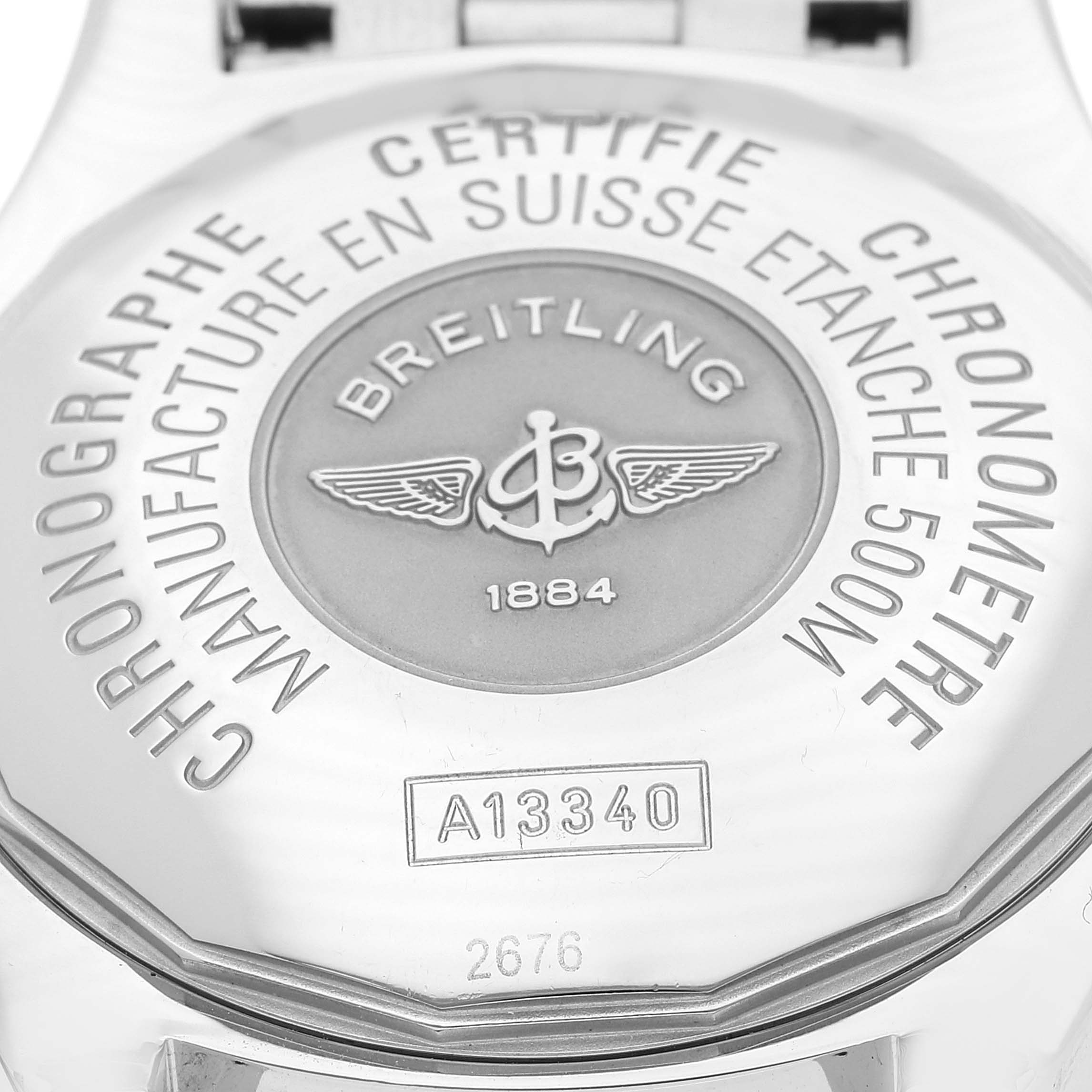 The image shows the back case of a Breitling Superocean A13340 Men's Stainless Steel Black Dial A13340 Men's Stainless Steel Black Dial watch, highlighting the engravings and model number.