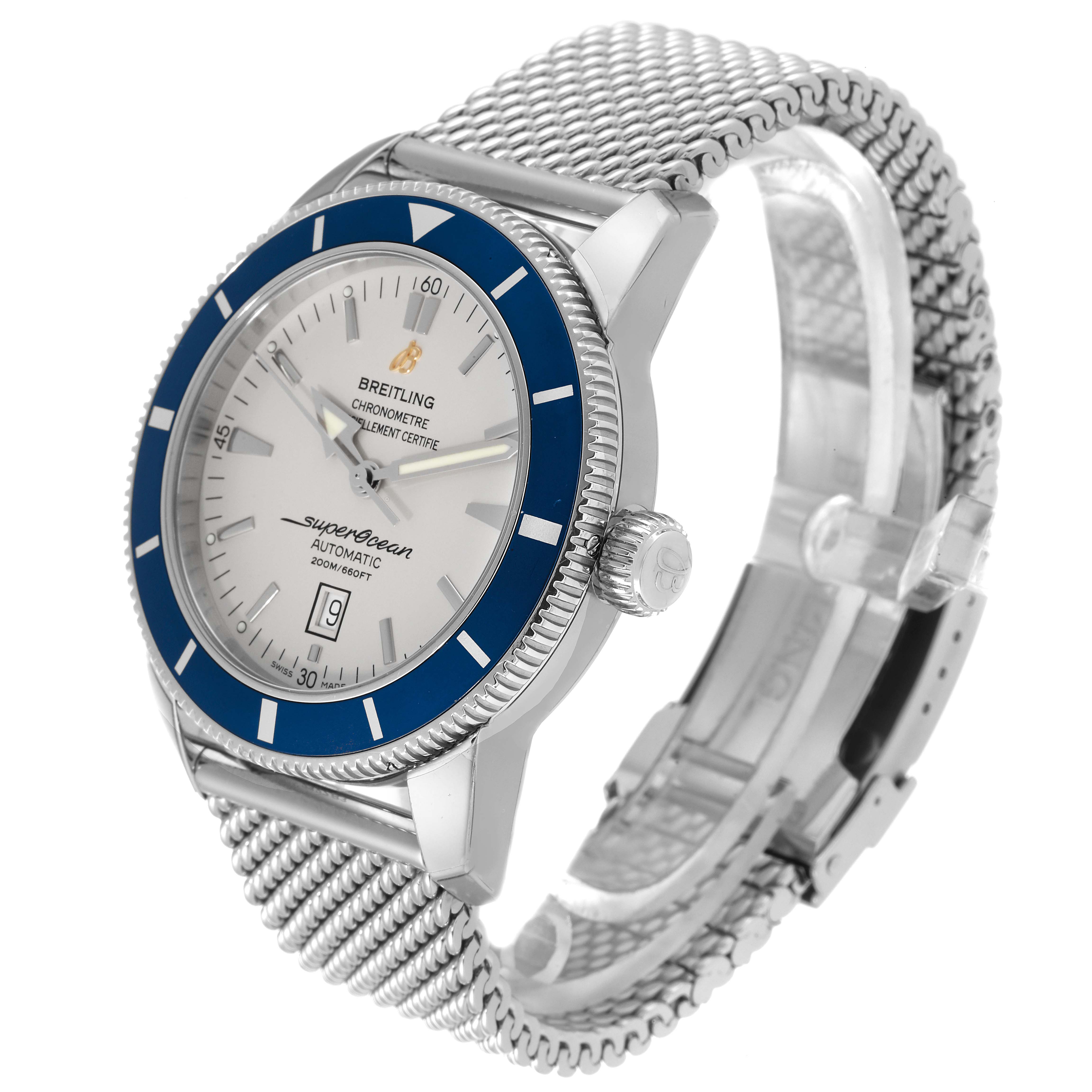 This image shows a side angle view of the Breitling Superocean A17320 Men's Stainless Steel Silver Dial A17320 Men's Stainless Steel Silver Dial watch, displaying its face, bezel, and mesh bracelet.