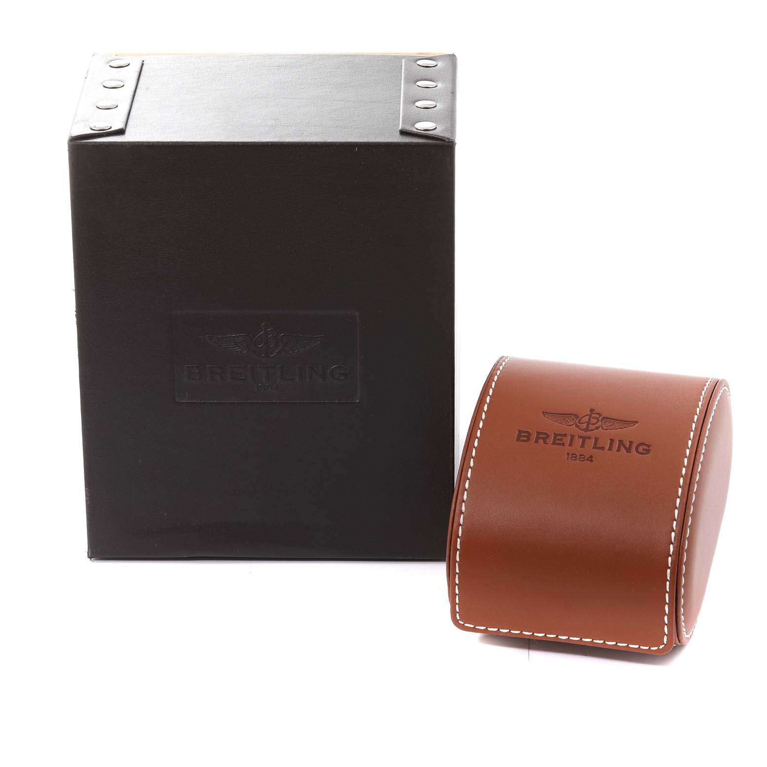 The image shows packaging for the Breitling Superocean A17320 Men's Stainless Steel Silver Dial A17320 Men's Stainless Steel Silver Dial watch, including a black box and a brown leather pouch with branding.