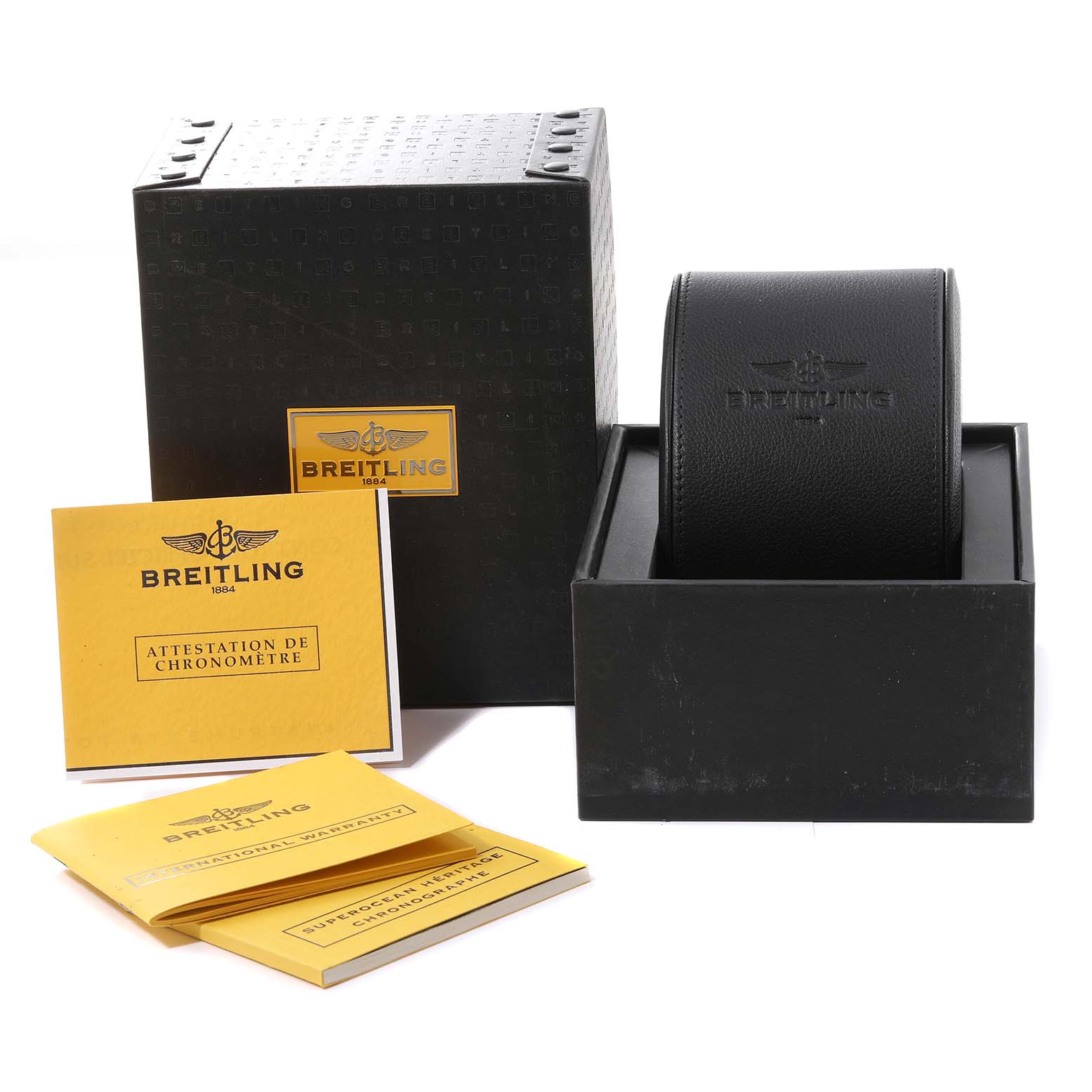 The image shows the packaging, warranty cards, and documentation for the Breitling Superocean A13320 Men's Stainless Steel Black Dial A13320 Men's Stainless Steel Black Dial watch, with branding clearly visible.