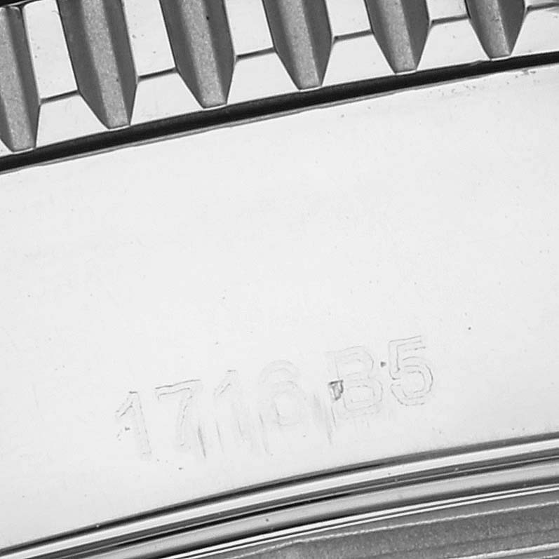 This image shows a close-up of the bezel teeth and serial number on the case back of a Breitling Superocean A17365D2/A766 Men's Stainless Steel White Dial A17365D2/A766 Men's Stainless Steel White Dial watch.