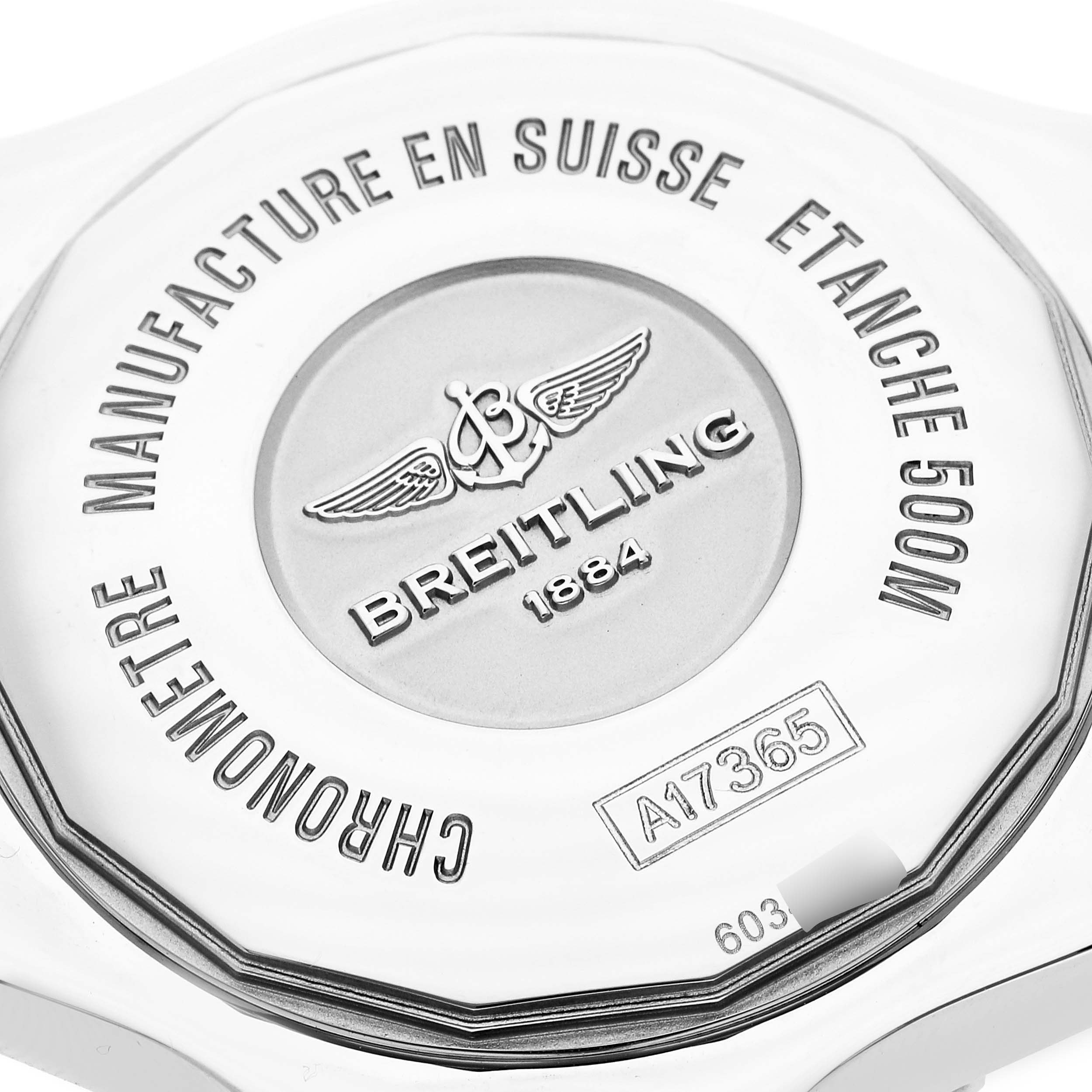 The image shows a close-up of the back case of a Breitling Superocean A17365D2/A766 Men's Stainless Steel White Dial A17365D2/A766 Men's Stainless Steel White Dial watch, highlighting the brand logo and engravings.