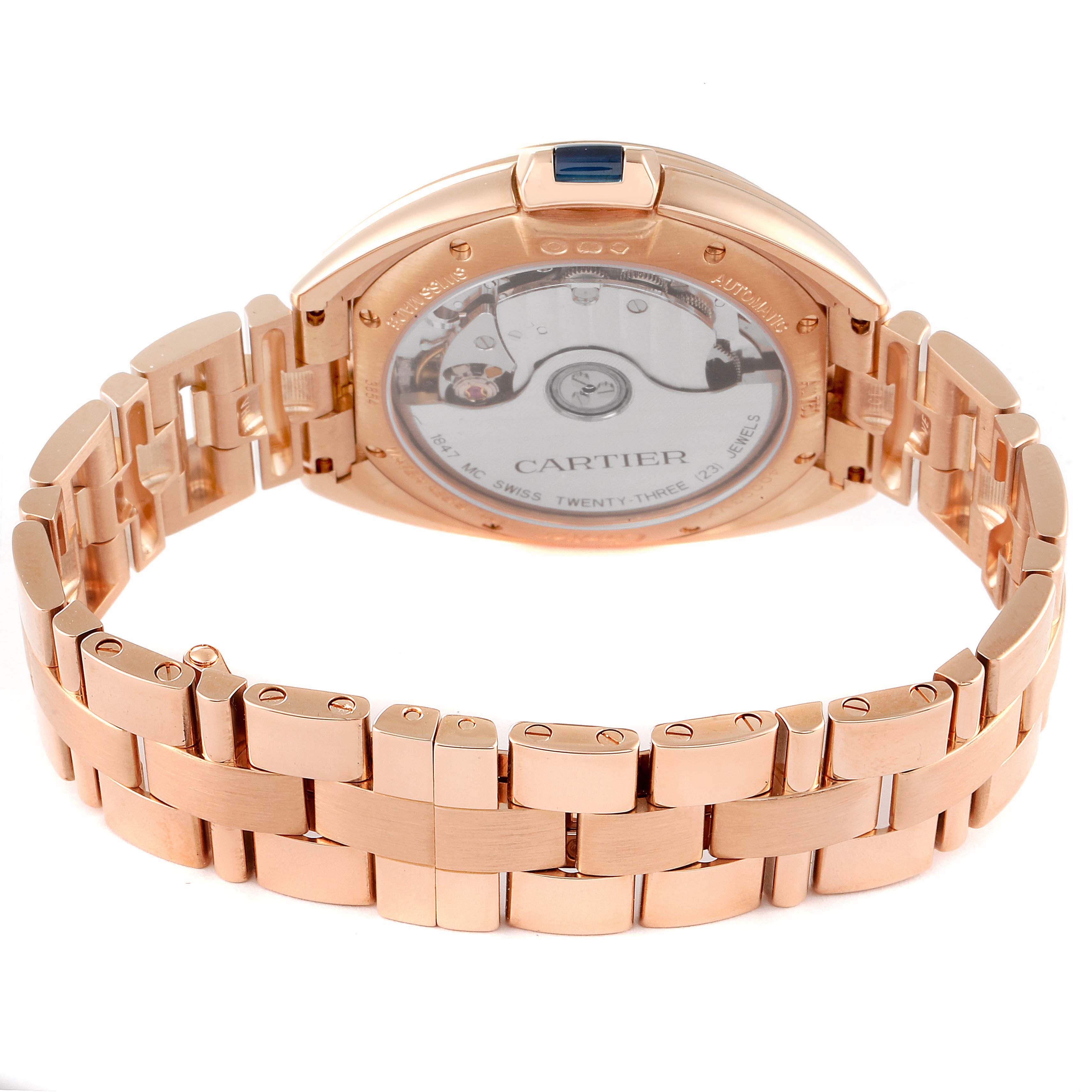 The image shows the backside and bracelet of the Cartier Cle WFCL0003 Women's Rose Gold Silver Dial WFCL0003 Women's Rose Gold Silver Dial watch, showcasing the movement and the rose gold bracelet.