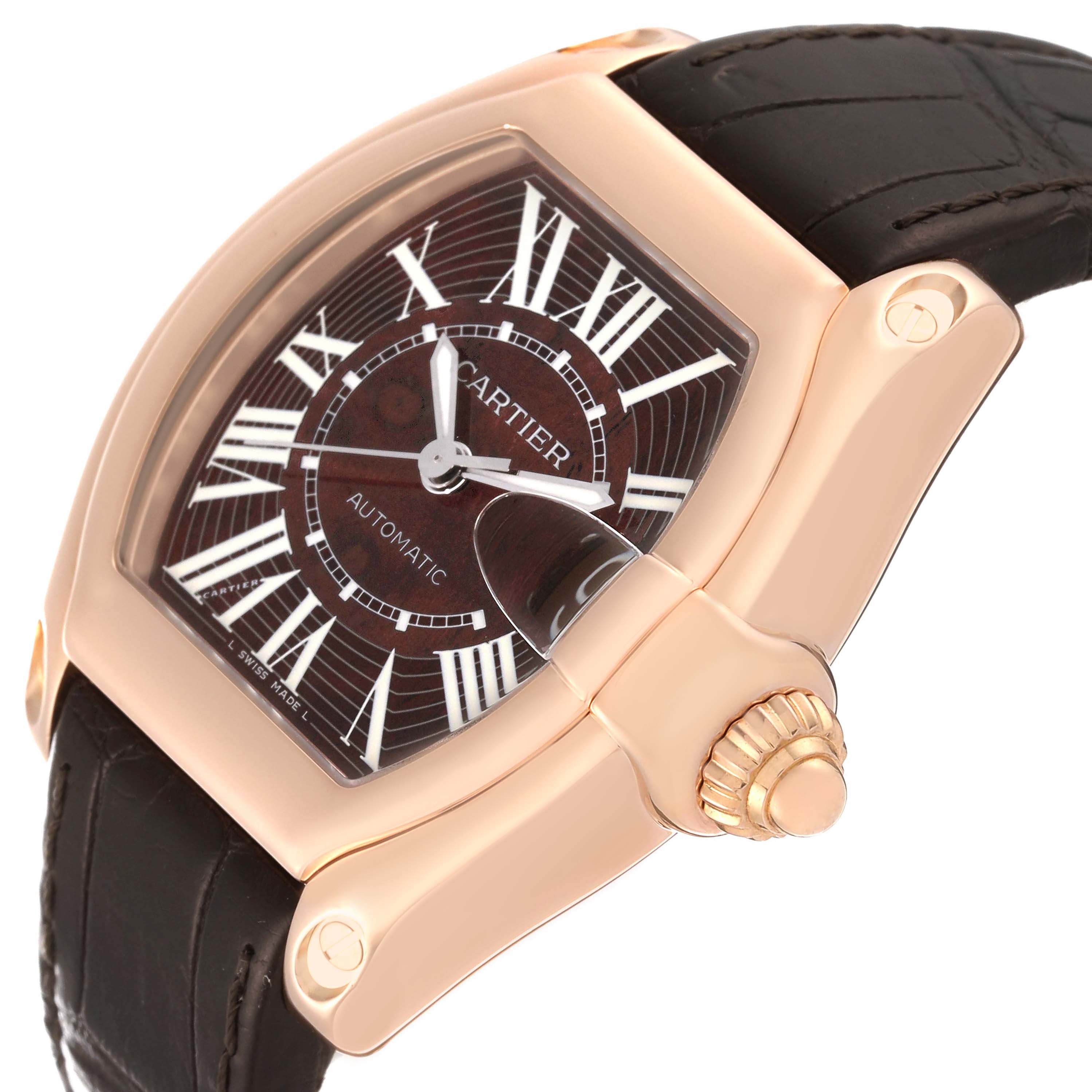 The Cartier Roadster W6206001 Men's Rose Gold Brown Dial W6206001 Men's Rose Gold Brown Dial watch is shown at an angled side view, highlighting the dial, crown, and part of the leather strap.
