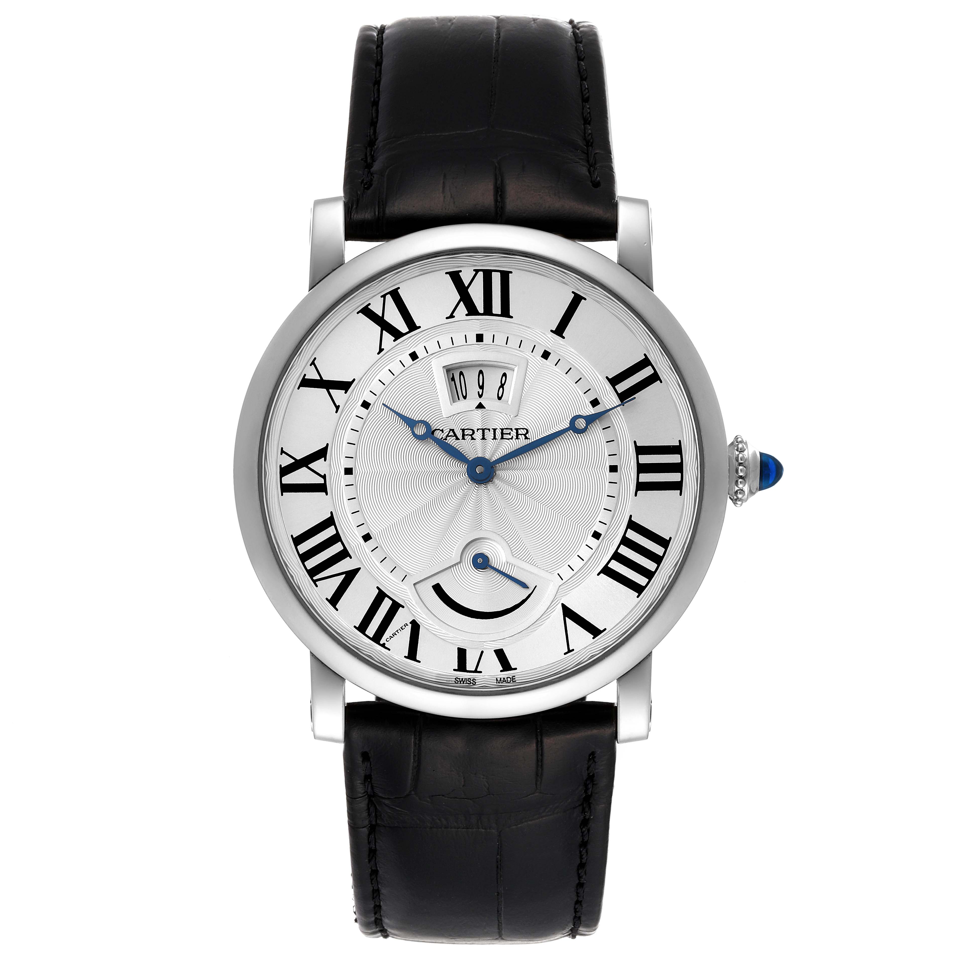 The image shows a front view of the Cartier Rotonde W1556369 Men's Stainless Steel Silver Dial W1556369 Men's Stainless Steel Silver Dial watch, highlighting its face, Roman numerals, date display, and black leather strap.