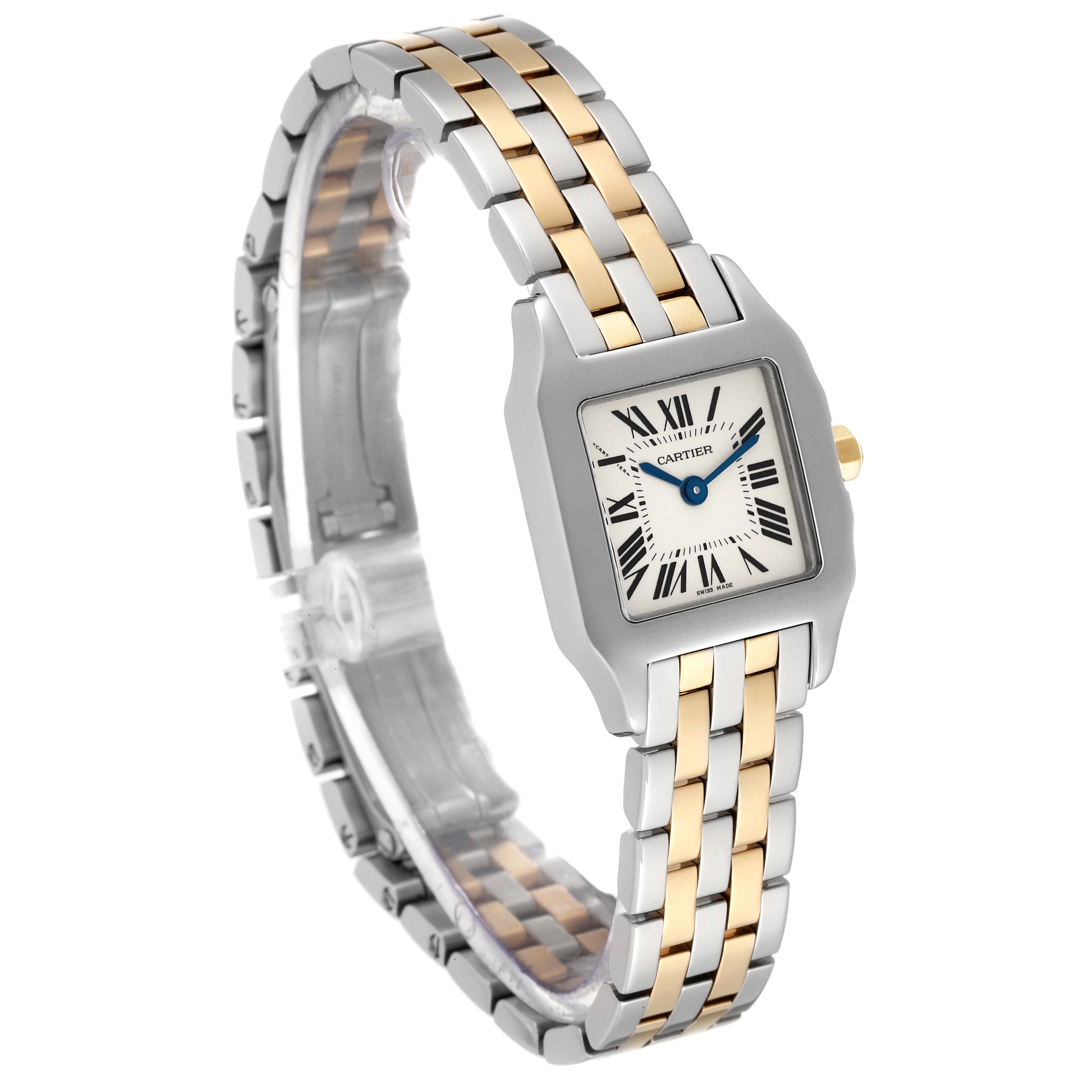 The image shows a Cartier Santos Demoiselle W25066Z6 Women
s Steel and Gold (two tone) Silver Dial W25066Z6 Women
s Steel and Gold (two tone) Silver Dial watch at a slight angle, highlighting its two-tone bracelet and square face with Roman numerals.