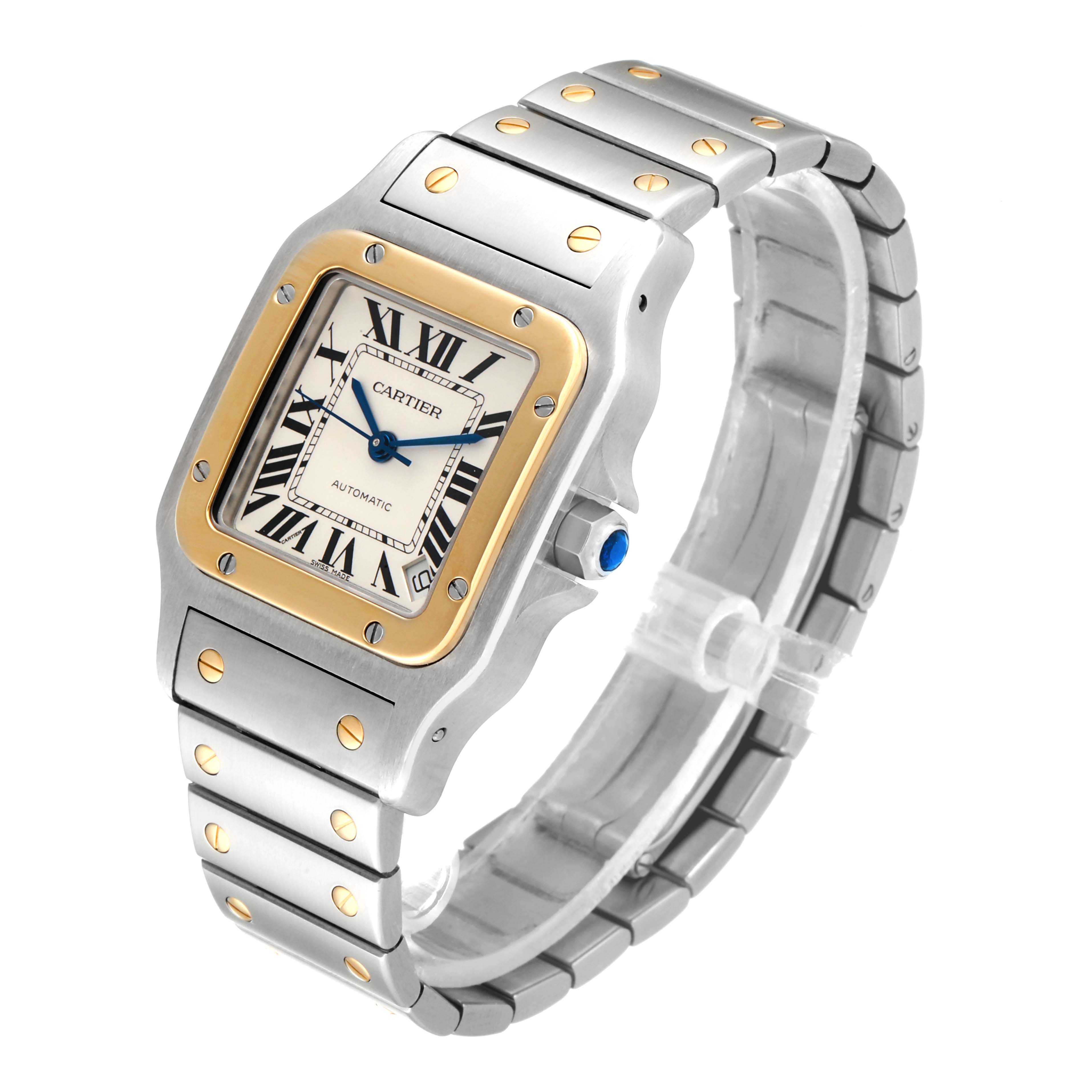 This image shows an angled view of a Cartier Santos W20099C4 Men
s Steel and Gold (two tone) Silver Dial W20099C4 Men
s Steel and Gold (two tone) Silver Dial watch, highlighting the face, bezel, and bracelet.