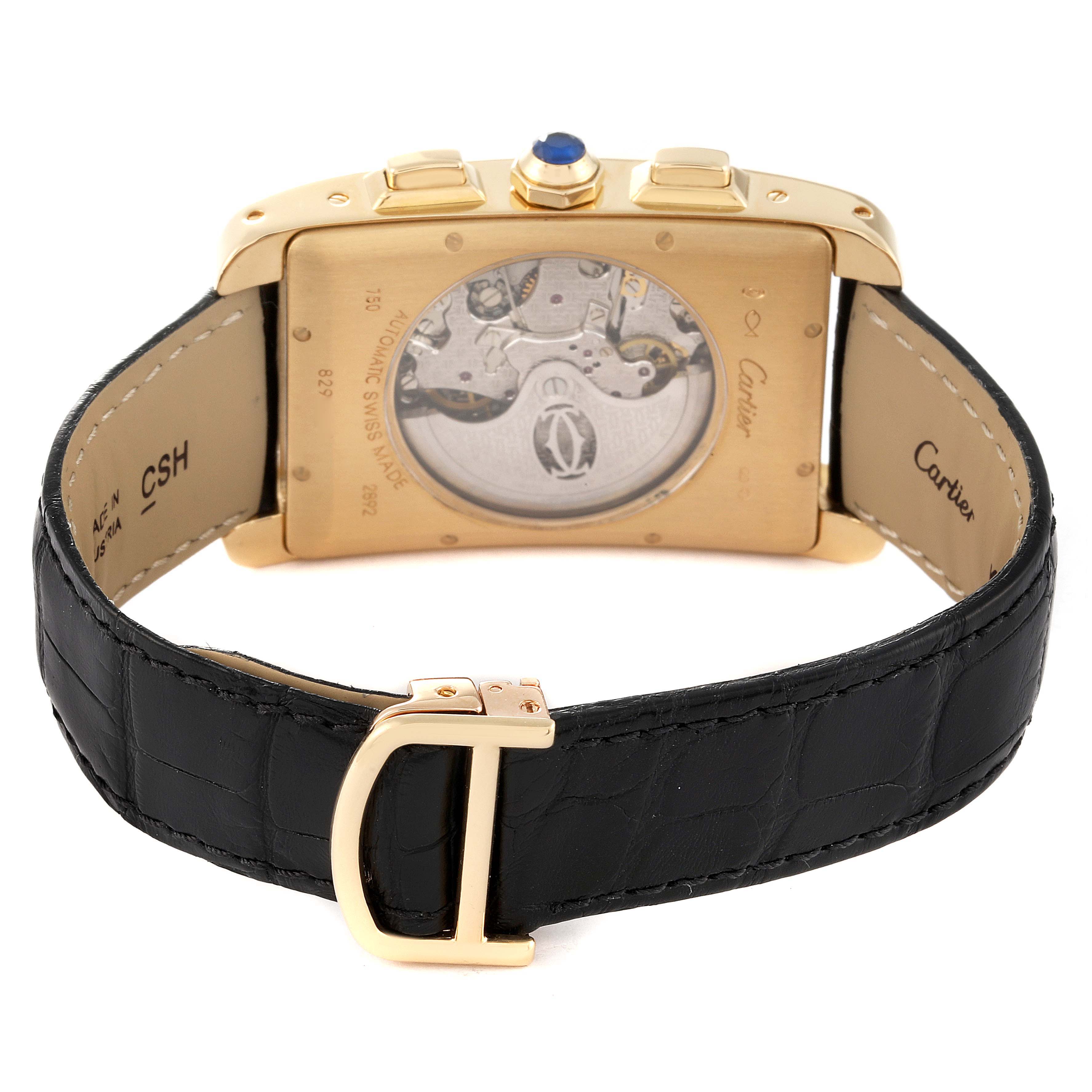 The image shows the back view of a Cartier Tank Americaine W2609256 Men's Yellow Gold Silver Dial W2609256 Men's Yellow Gold Silver Dial watch, highlighting its movement and black leather strap with a gold buckle.