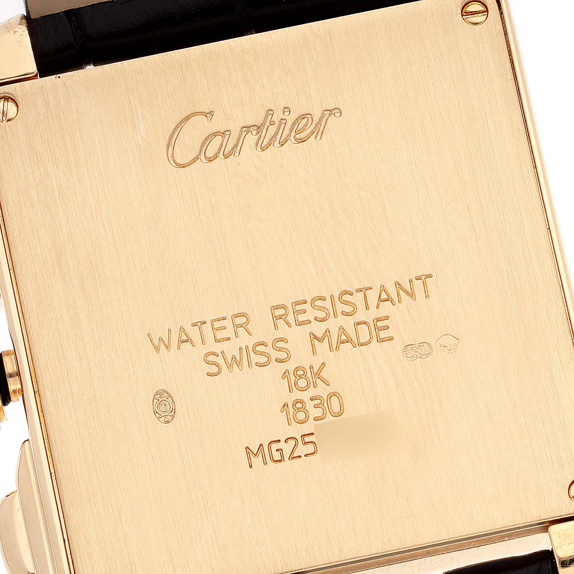 The image shows the back case of a Cartier Tank Francaise W5000556 Men's Yellow Gold Silver Dial W5000556 Men's Yellow Gold Silver Dial watch, highlighting its inscriptions and material details.