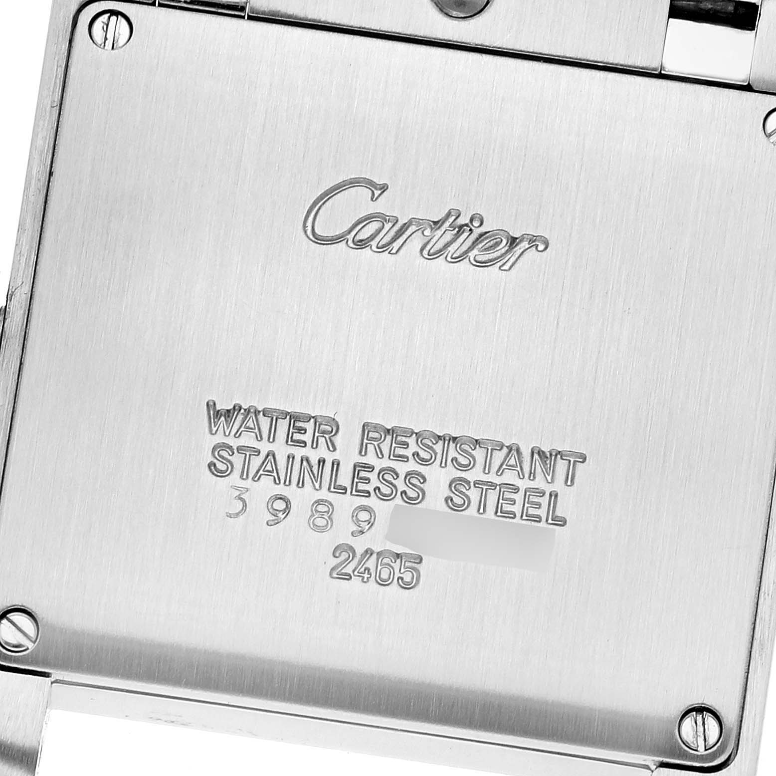 This image shows the back case of a Tank Française watch by Cartier, highlighting model details and material.