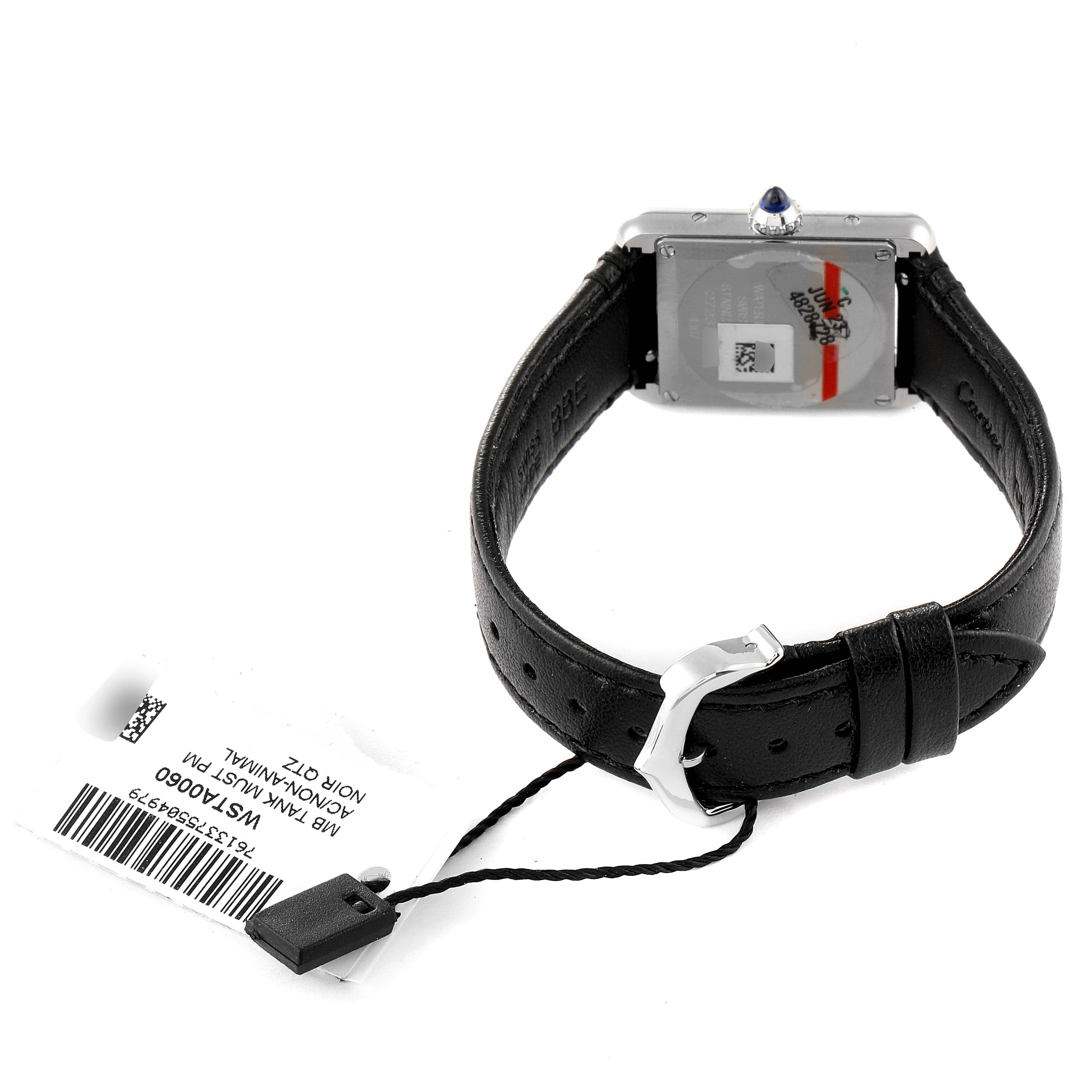 The image shows the back view of the Cartier Tank Must WSTA0060 Women's Stainless Steel Silver Dial WSTA0060 Women's Stainless Steel Silver Dial watch model, highlighting the clasp, strap, and case back.