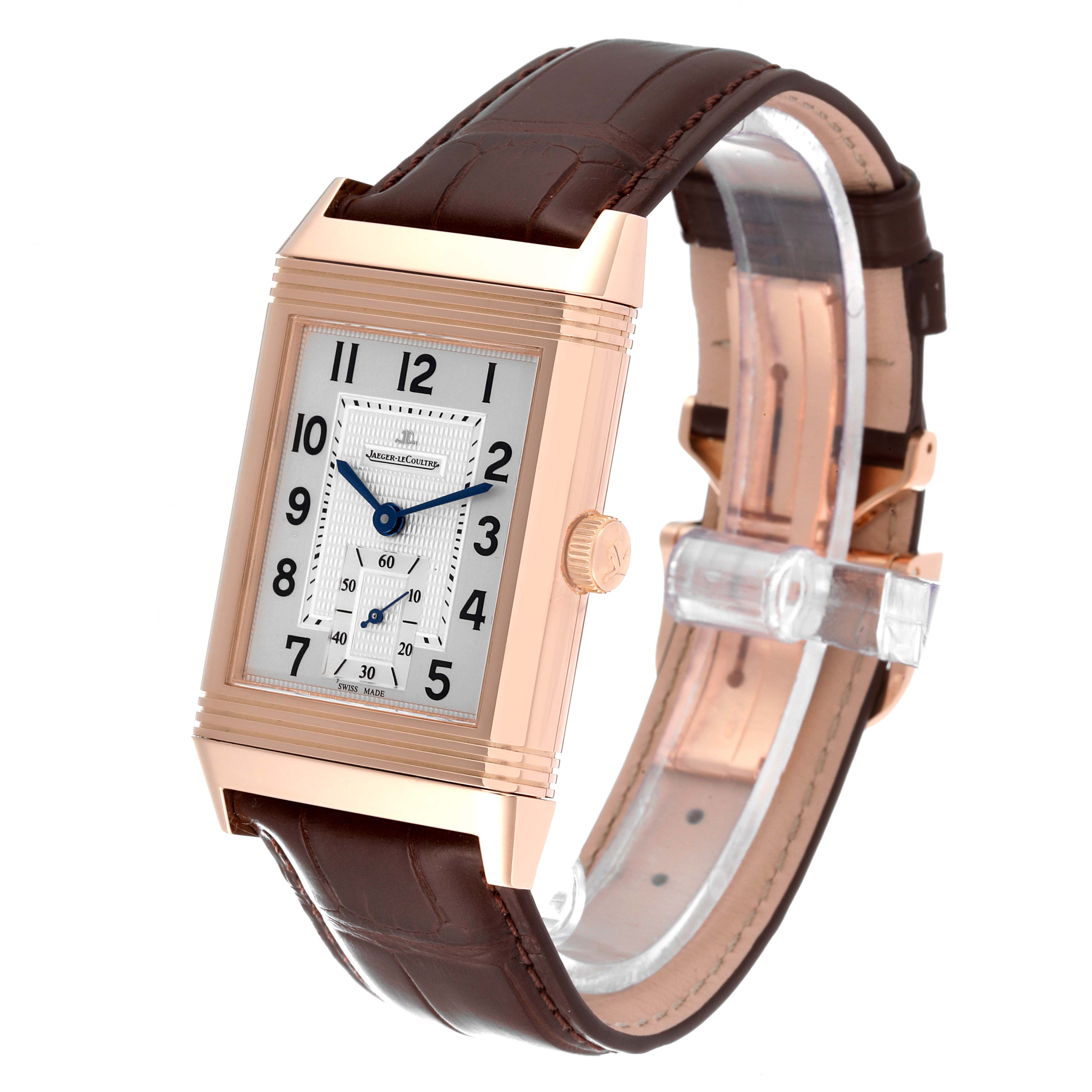 This image shows a Jaeger-LeCoultre Reverso watch at a three-quarter angle, highlighting the dial, crown, and leather strap.