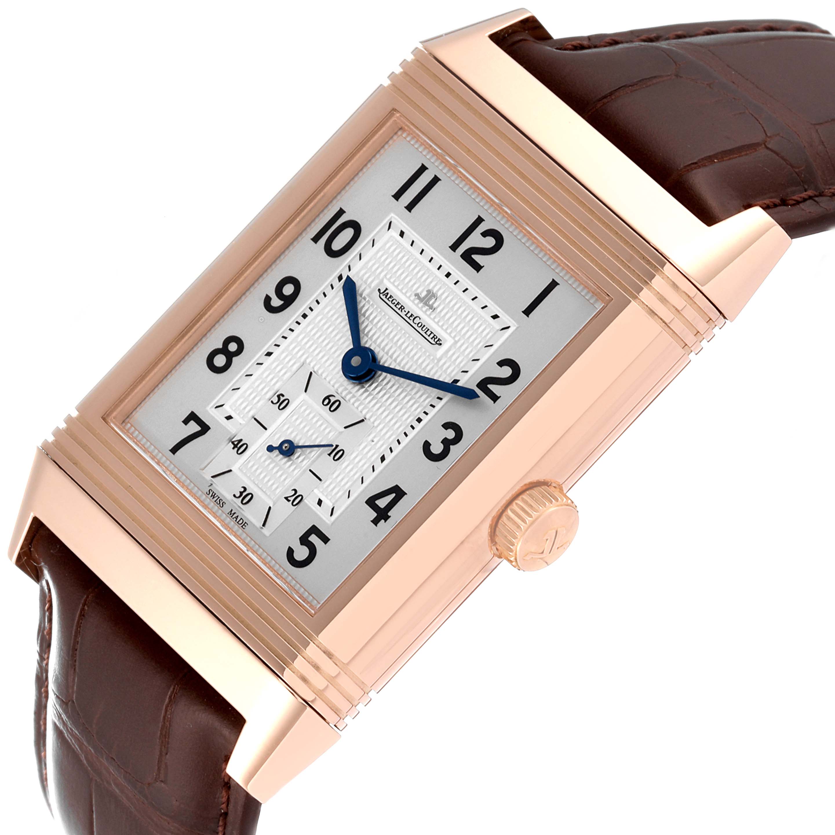 The image shows a Jaeger LeCoultre Reverso Q3732420 Men's Rose Gold Silver Dial Q3732420 Men's Rose Gold Silver Dial watch angled slightly to the left, highlighting its gold case and brown leather strap.
