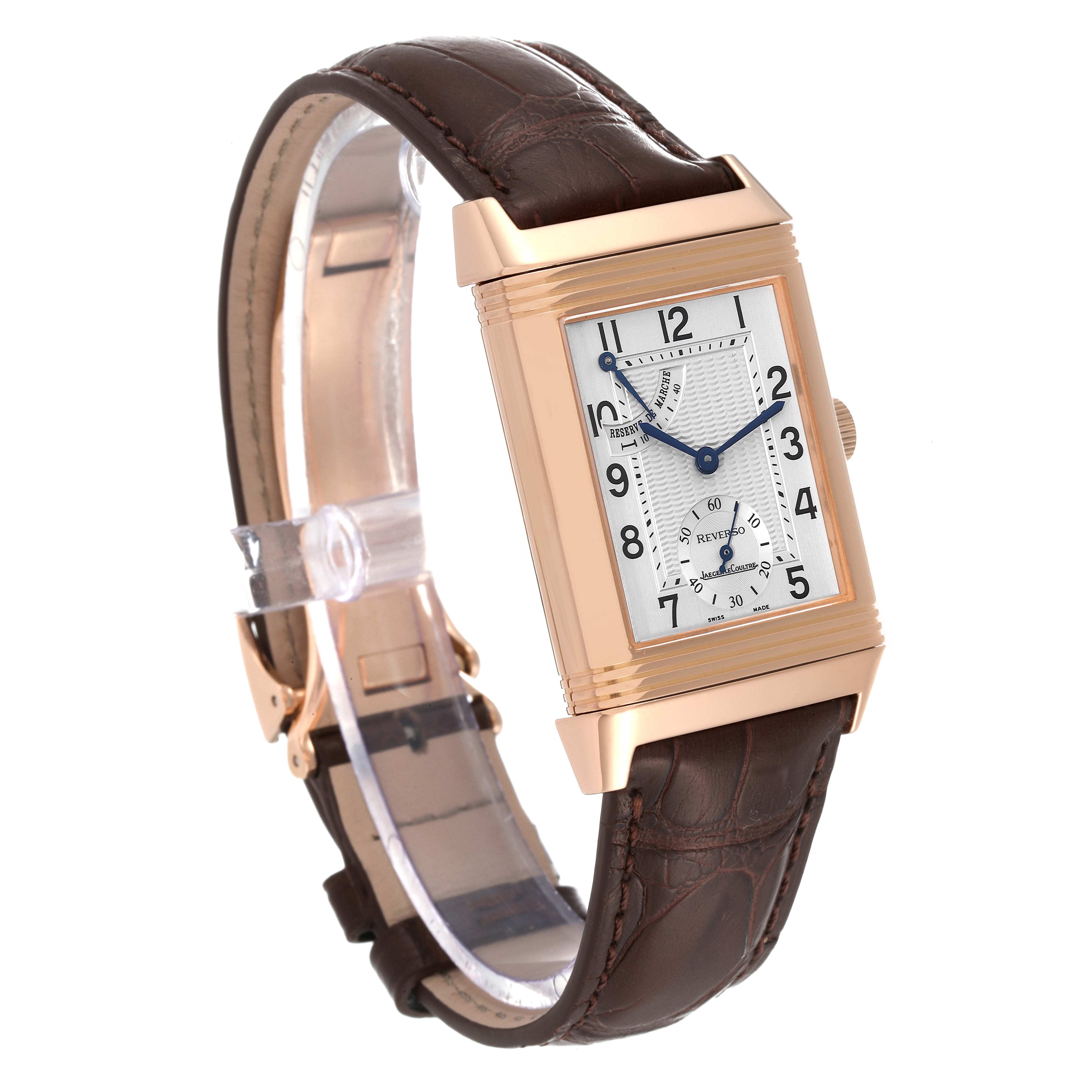 This image shows a Jaeger LeCoultre Reverso Q2702420 Men
s Rose Gold Silver Dial Q2702420 Men
s Rose Gold Silver Dial model watch from a side angle, displaying the watch face and leather strap.