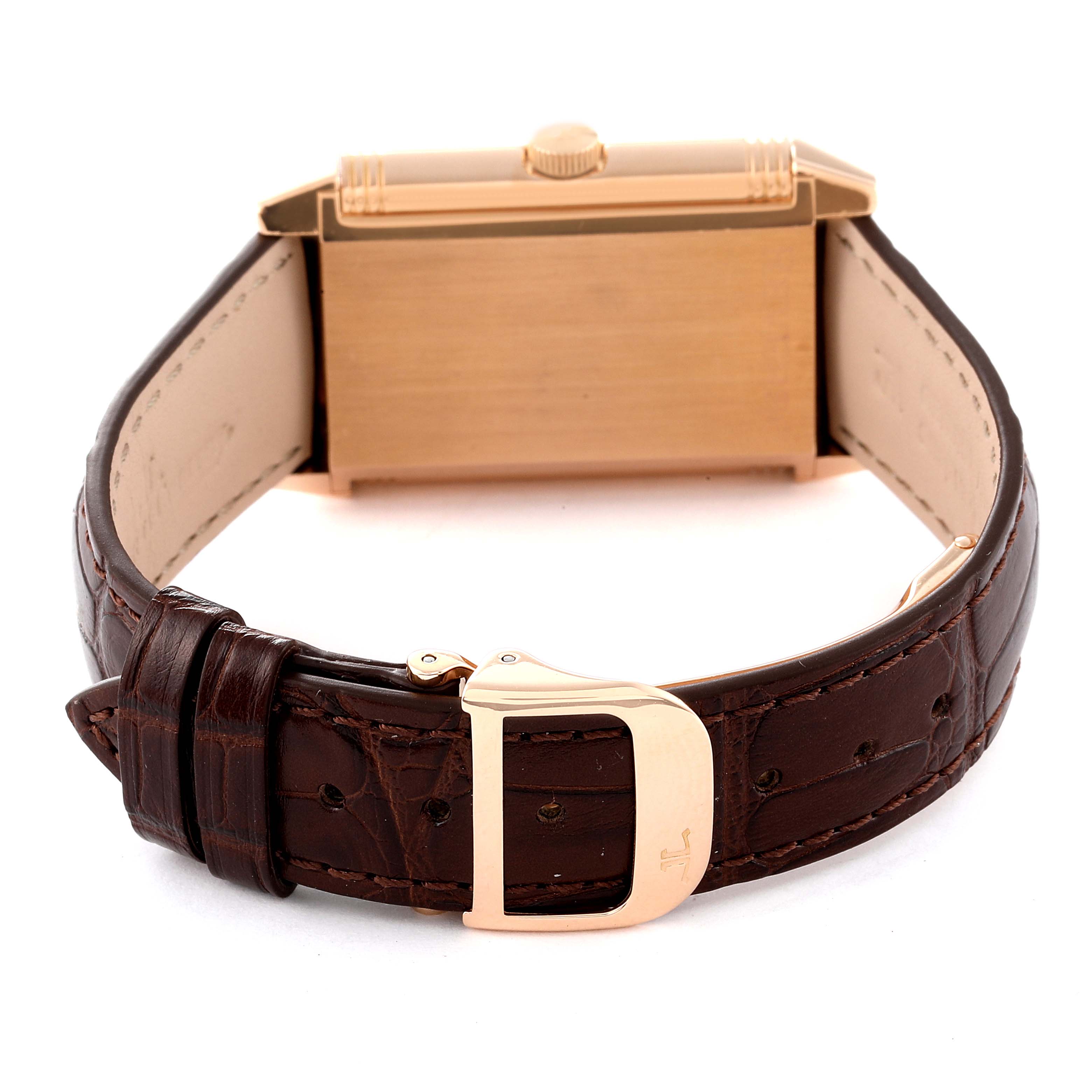 The image shows the back side and clasp of a Jaeger LeCoultre Reverso Q2702420 Men
s Rose Gold Silver Dial Q2702420 Men
s Rose Gold Silver Dial watch, highlighting its strap and buckle.