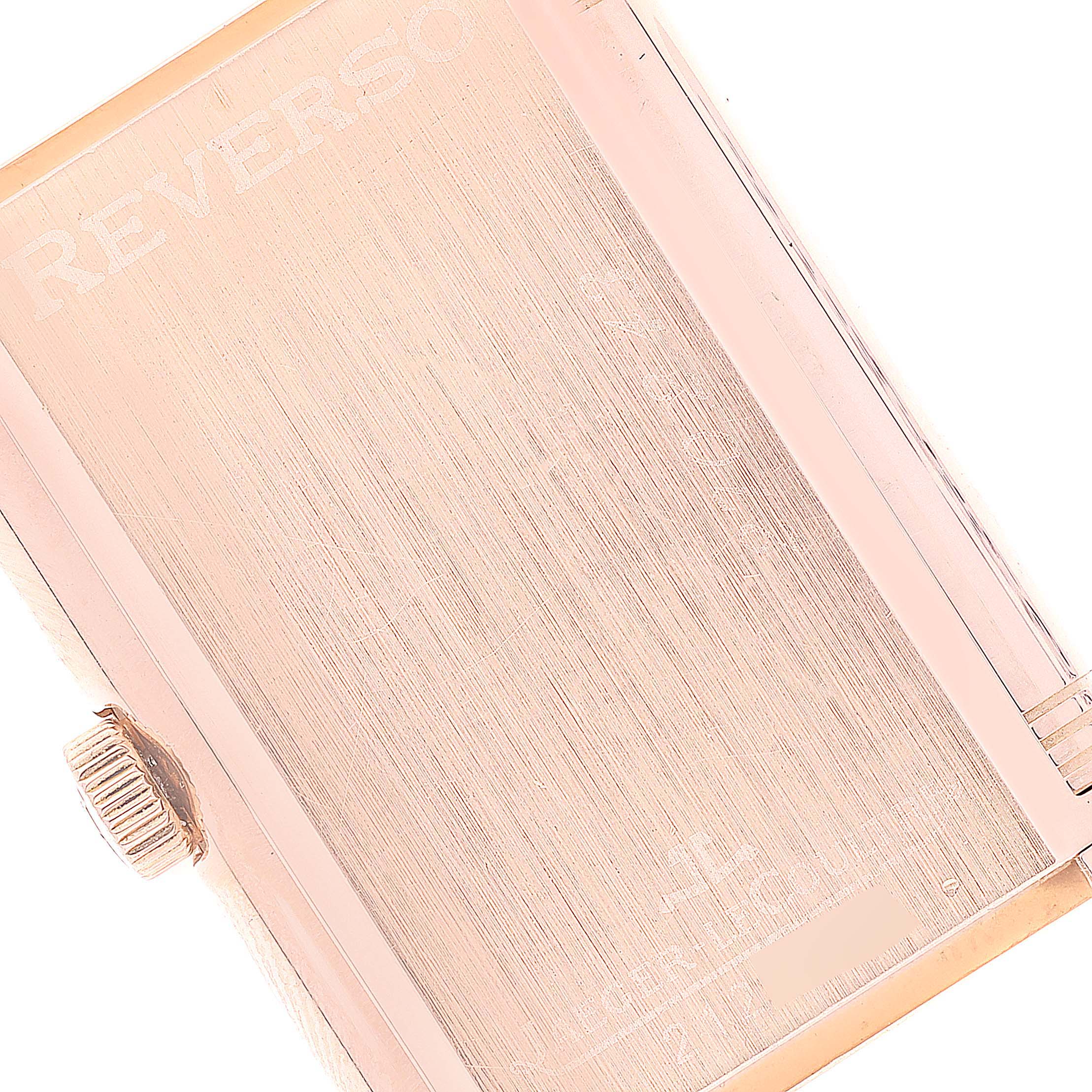 This image shows a close-up of the back case and crown of a Jaeger LeCoultre Reverso Q2702420 Men
s Rose Gold Silver Dial Q2702420 Men
s Rose Gold Silver Dial watch.