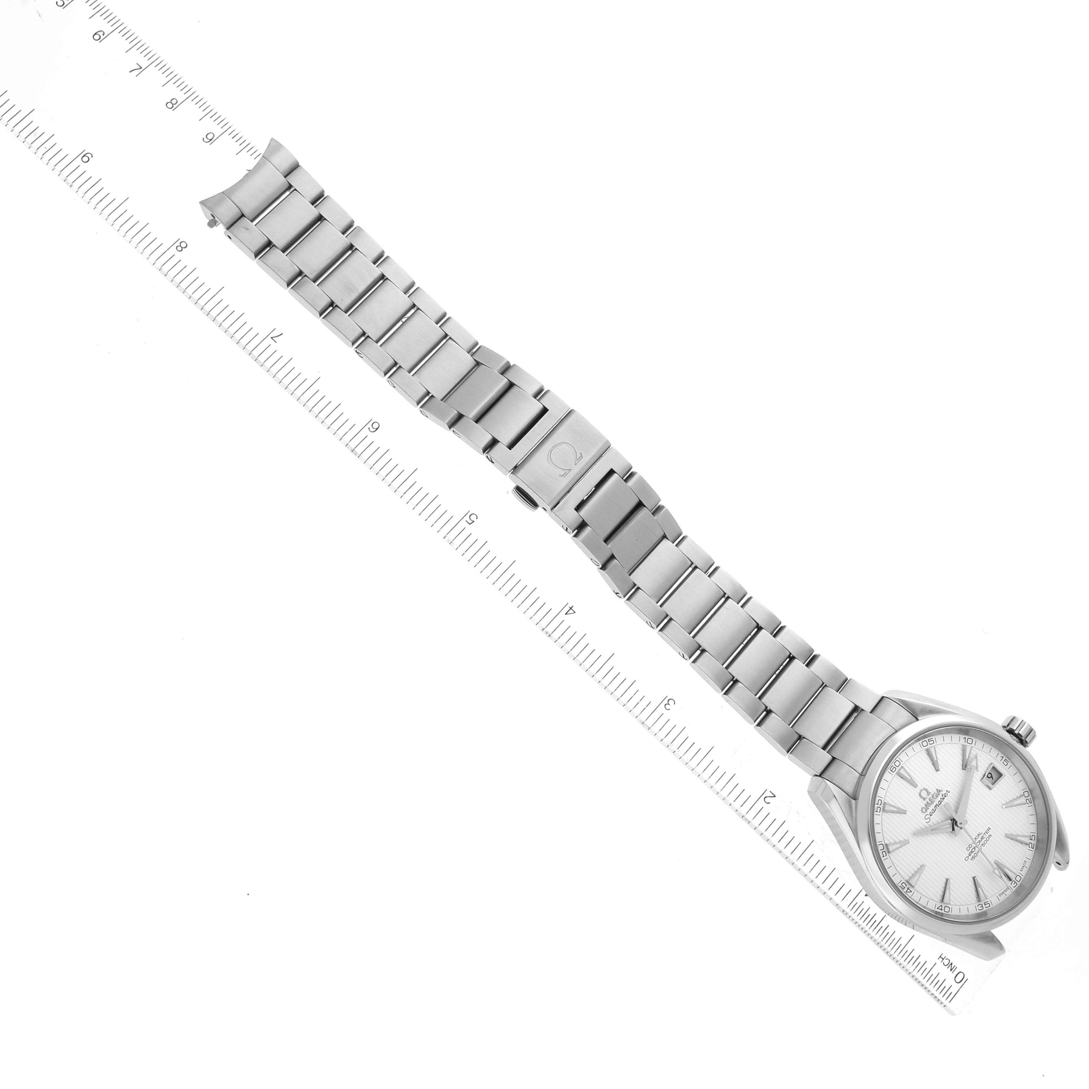 The image shows an Omega Aqua Terra 231.10.42.21.02.001 Men
s Stainless Steel Silver Dial 231.10.42.21.02.001 Men
s Stainless Steel Silver Dial watch with a metal bracelet laid flat, alongside a ruler for size reference.