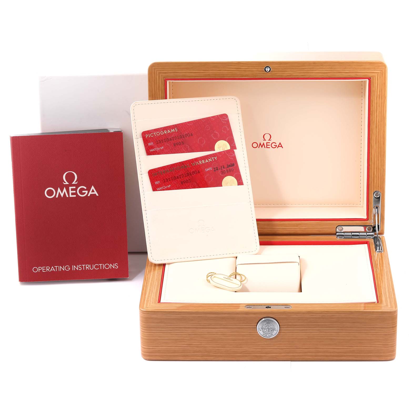 The image shows a wooden box, two red cards in a holder, and an operating instructions booklet for the Omega Aqua Terra 231.10.42.21.01.004 Men's Stainless Steel Black Dial 231.10.42.21.01.004 Men's Stainless Steel Black Dial model watch.