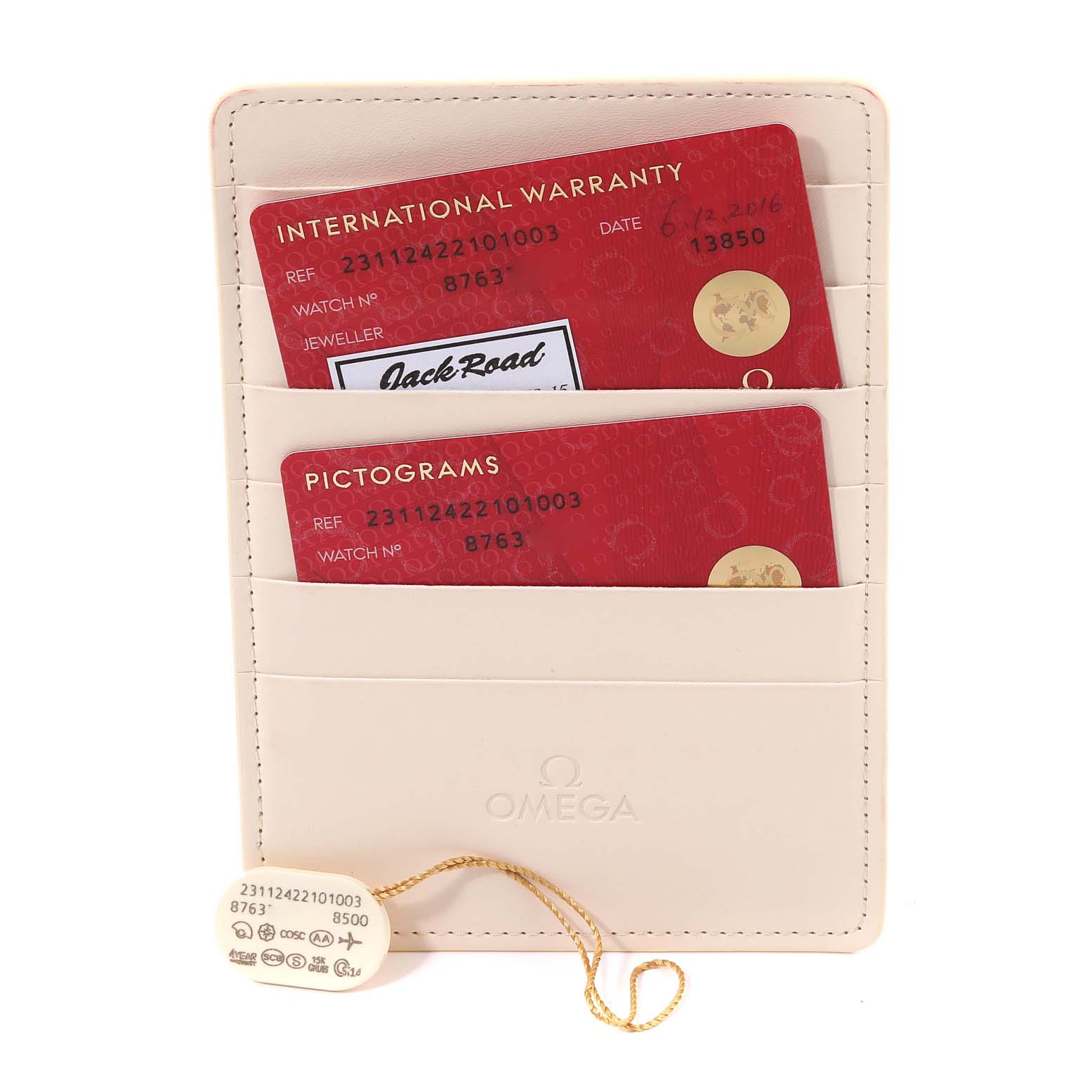 The image shows warranty and pictogram cards with a cream-colored holder and a tag for the Omega Aqua Terra 231.12.42.21.01.003 Men's Stainless Steel Black Dial 231.12.42.21.01.003 Men's Stainless Steel Black Dial model watch.