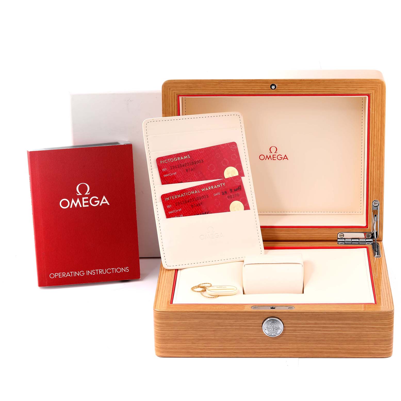 This image shows the Omega Aqua Terra 231.10.42.21.03.003 Men
s Stainless Steel Blue Dial 231.10.42.21.03.003 Men
s Stainless Steel Blue Dial watch
s wooden case, instruction manual, warranty cards, and accessories.