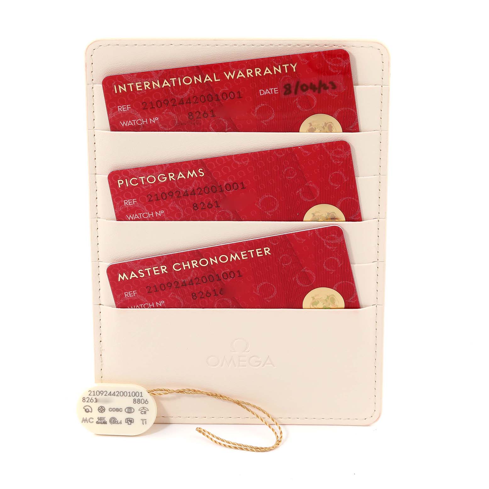 This image shows the warranty and certification cards for an Omega Seamaster 210.92.44.20.01.001 Men's Ceramic Black Dial 210.92.44.20.01.001 Men's Ceramic Black Dial model along with a tag, all placed inside a white cardholder.