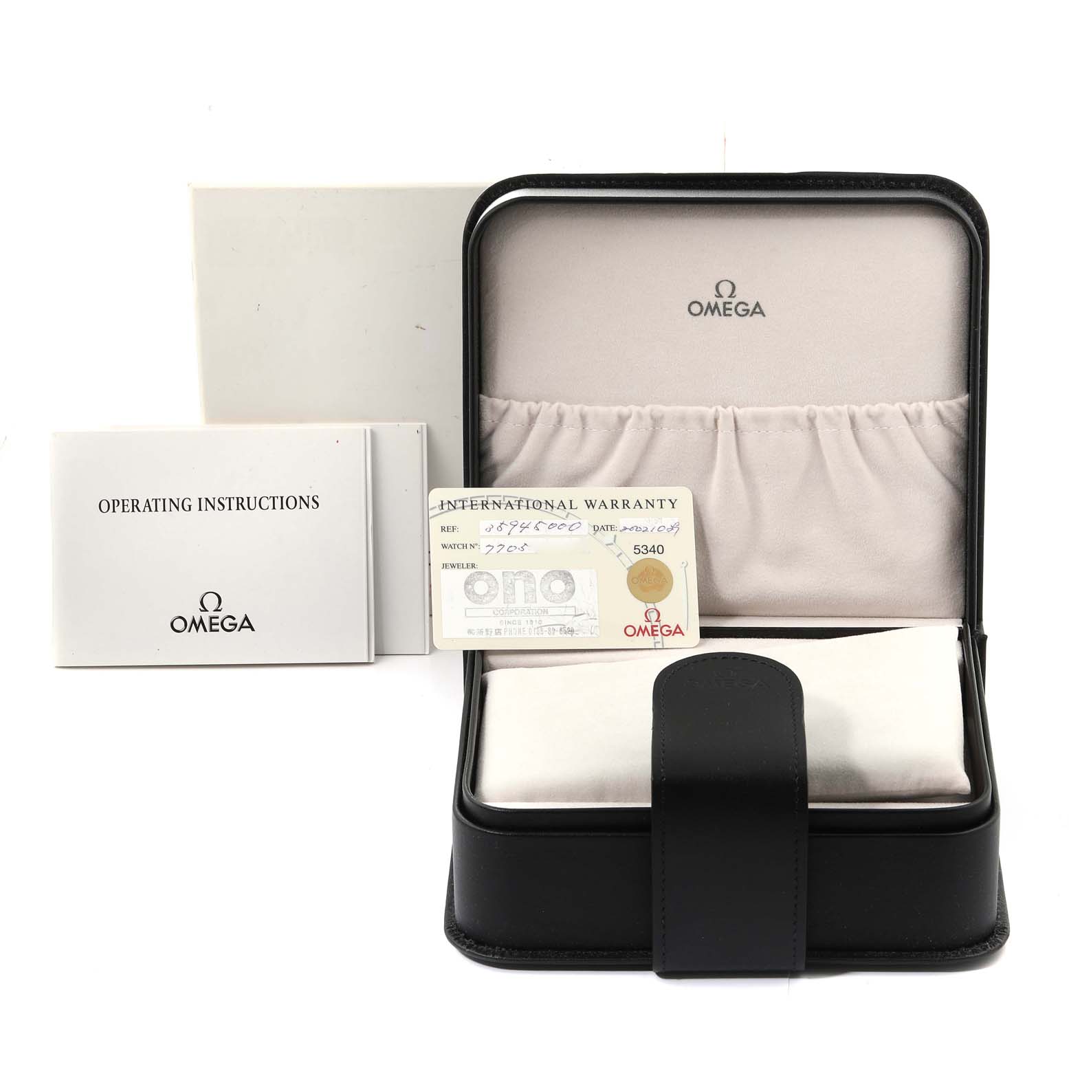 The image shows an Omega Speedmaster 3594.50.00 Men
s Stainless Steel Black Dial 3594.50.00 Men
s Stainless Steel Black Dial watch box, international warranty card, and the operating instructions manual.