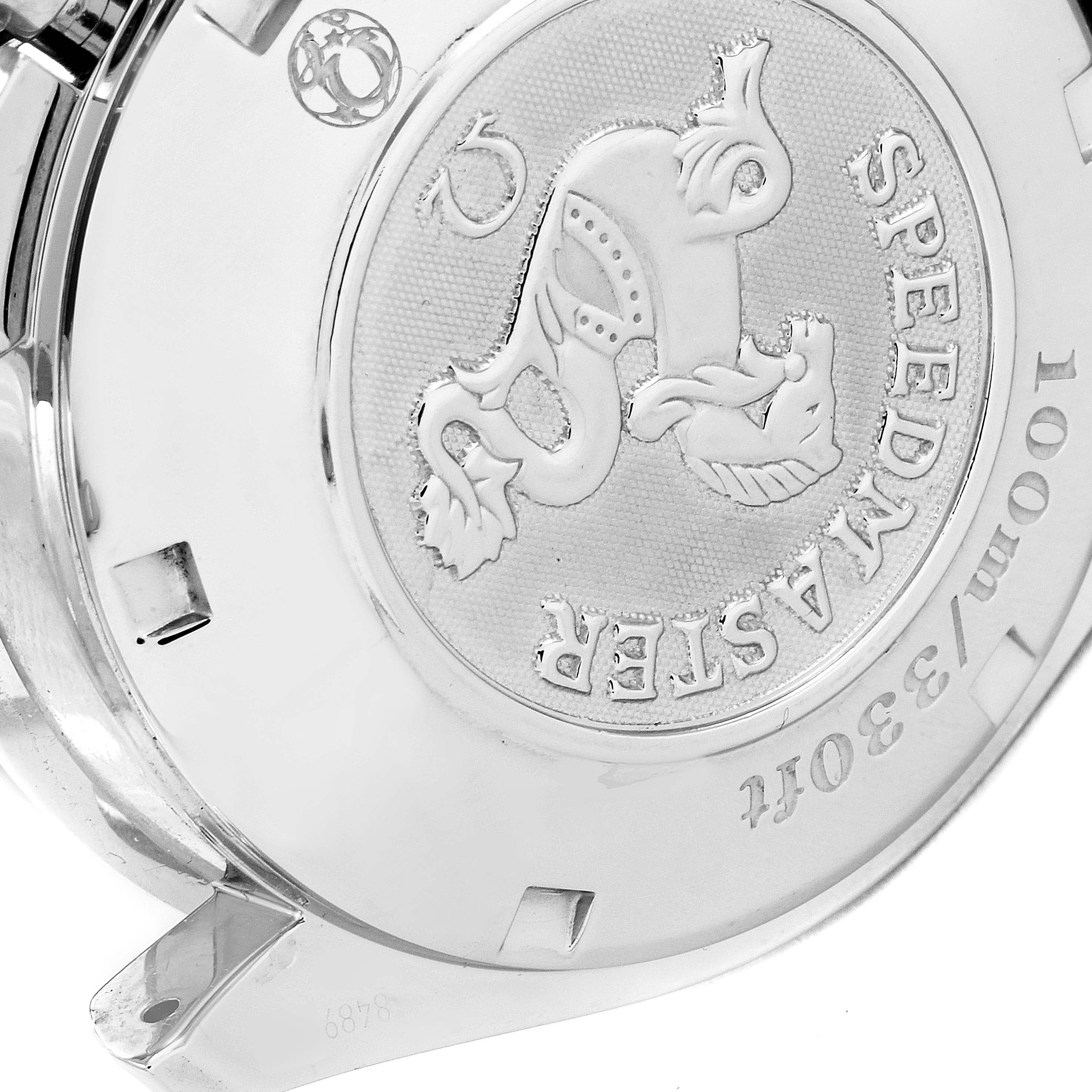 The image shows the case back of the Omega Speedmaster 323.30.40.40.04.001 Men's Stainless Steel White Dial 323.30.40.40.04.001 Men's Stainless Steel White Dial watch, featuring an engraved design and model details.