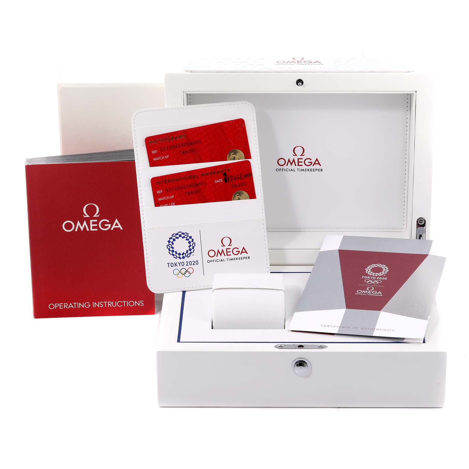 The image shows the packaging, instruction manuals, warranty cards, and a white box for an Omega Speedmaster 522.30.42.30.06.001 Men's Stainless Steel Silver Dial 522.30.42.30.06.001 Men's Stainless Steel Silver Dial watch.