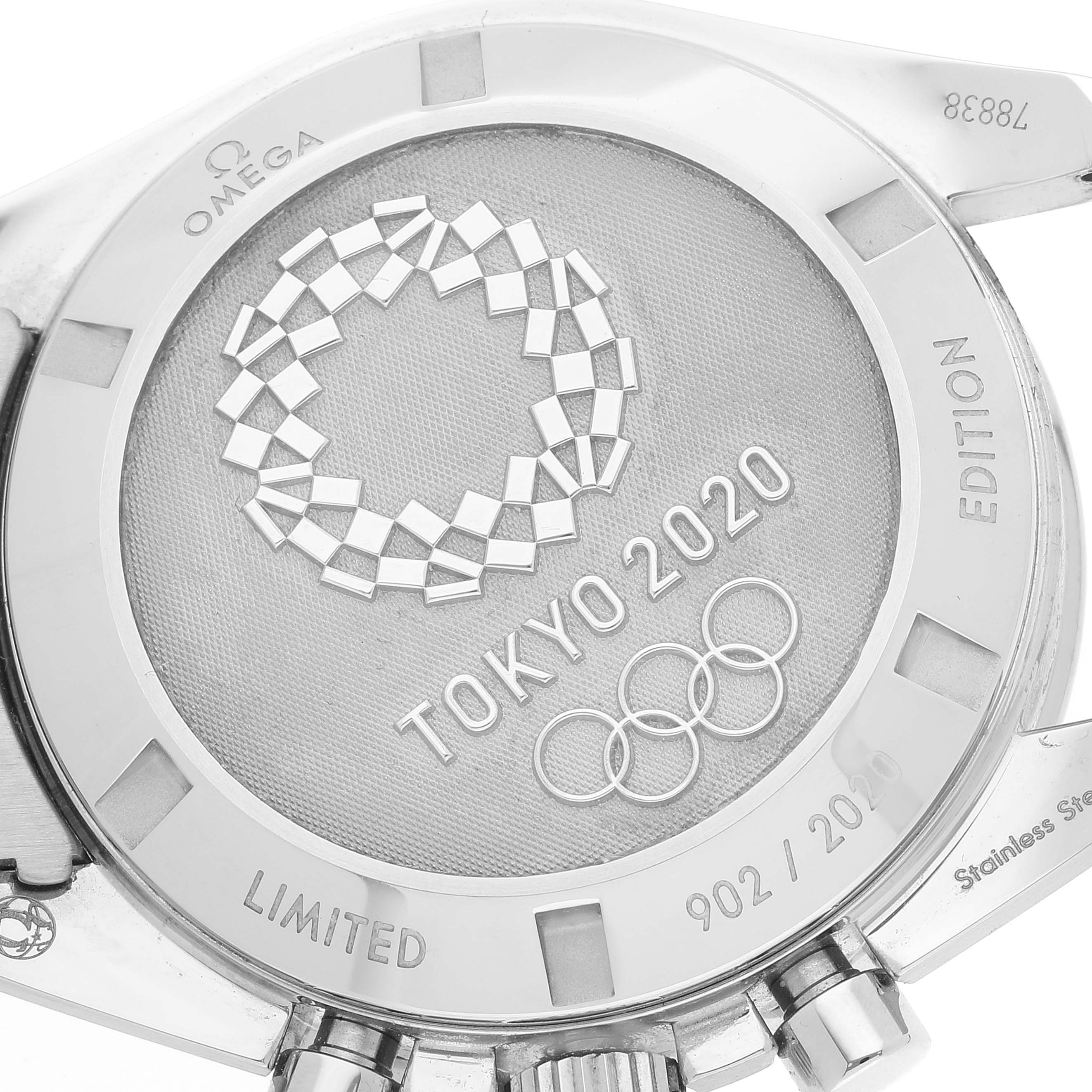 The image shows the case back of an Omega Speedmaster 522.30.42.30.06.001 Men's Stainless Steel Silver Dial 522.30.42.30.06.001 Men's Stainless Steel Silver Dial watch, featuring Tokyo 2020 commemorative engravings.
