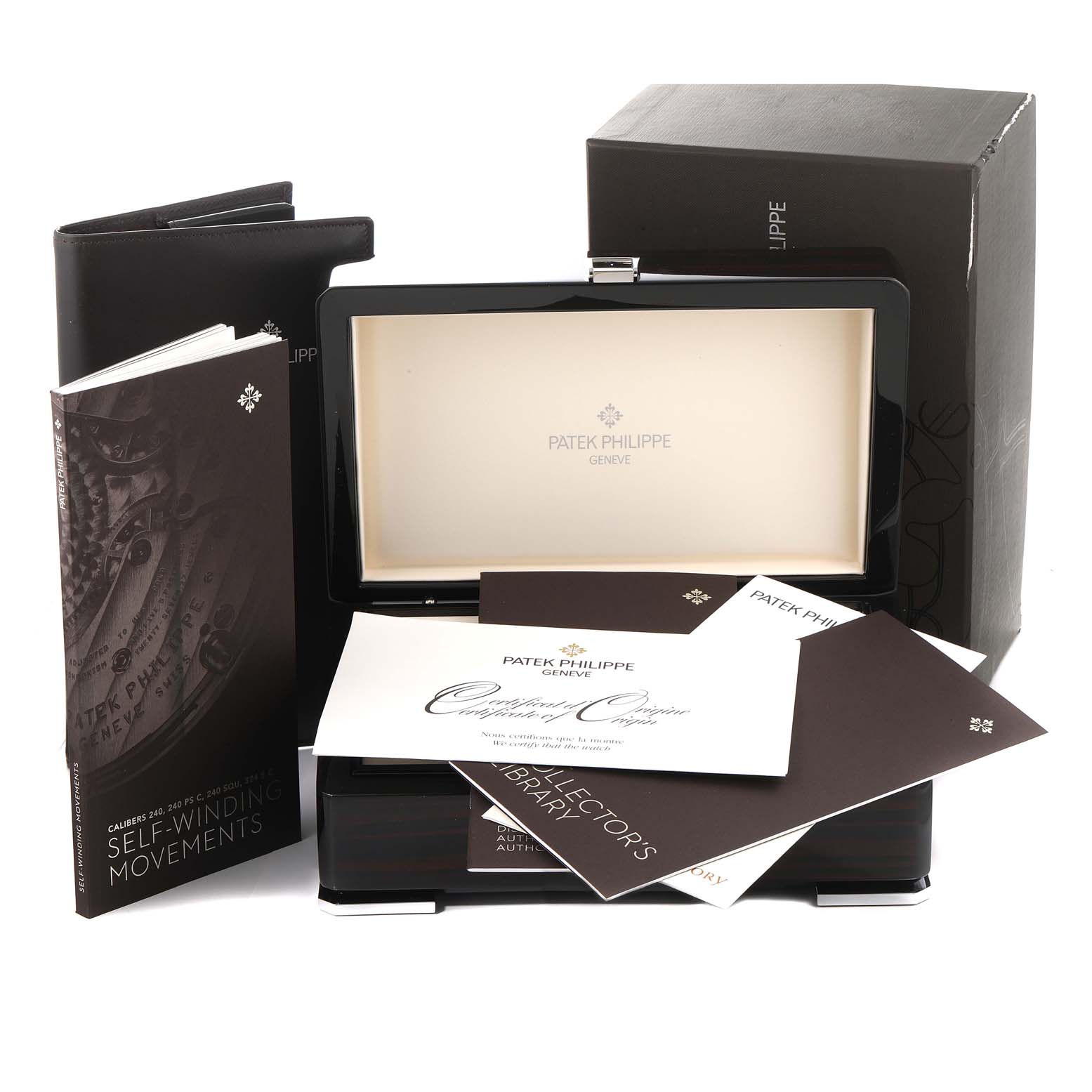 The image shows the packaging, box, and documentation for a Patek Philippe Aquanaut 5167A Men's Stainless Steel Black Dial 5167A Men's Stainless Steel Black Dial model, viewed from the front.