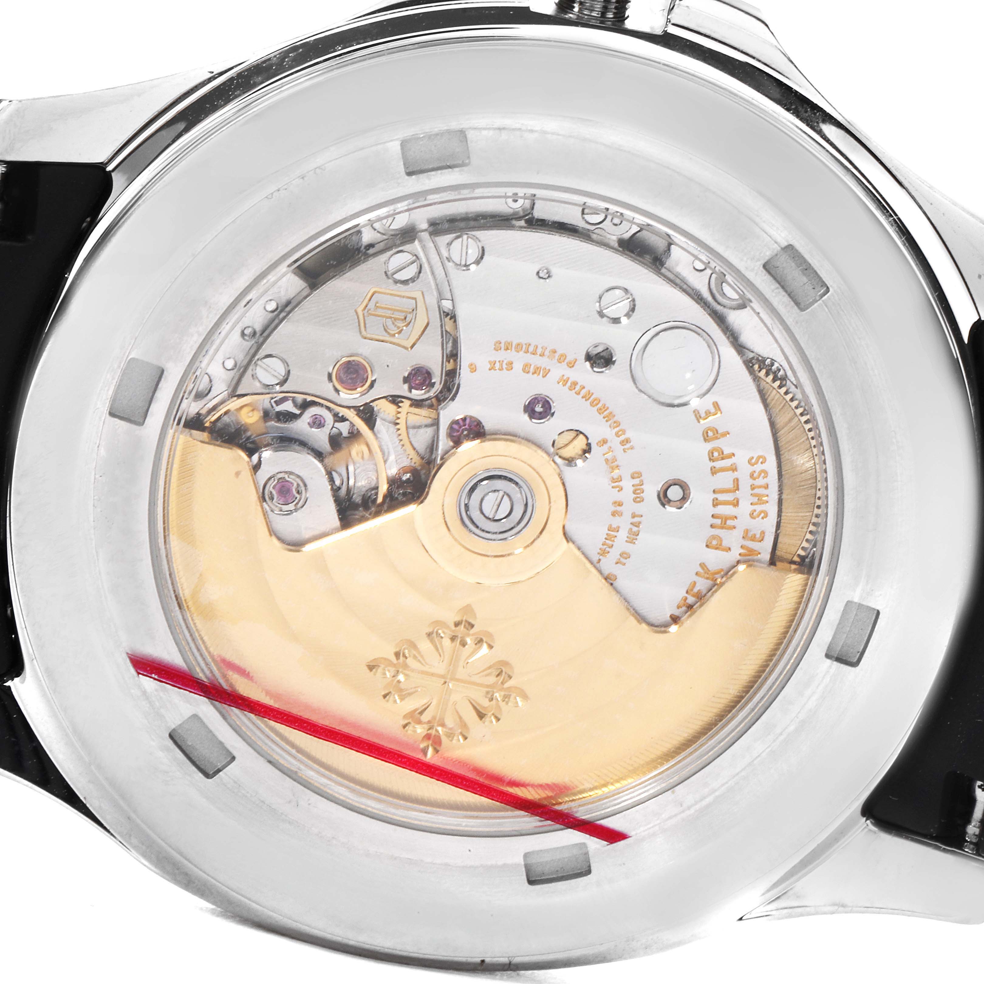 The image shows the back view of a Patek Philippe Aquanaut 5167A Men's Stainless Steel Black Dial 5167A Men's Stainless Steel Black Dial watch, highlighting its intricate movement and rotor mechanism.