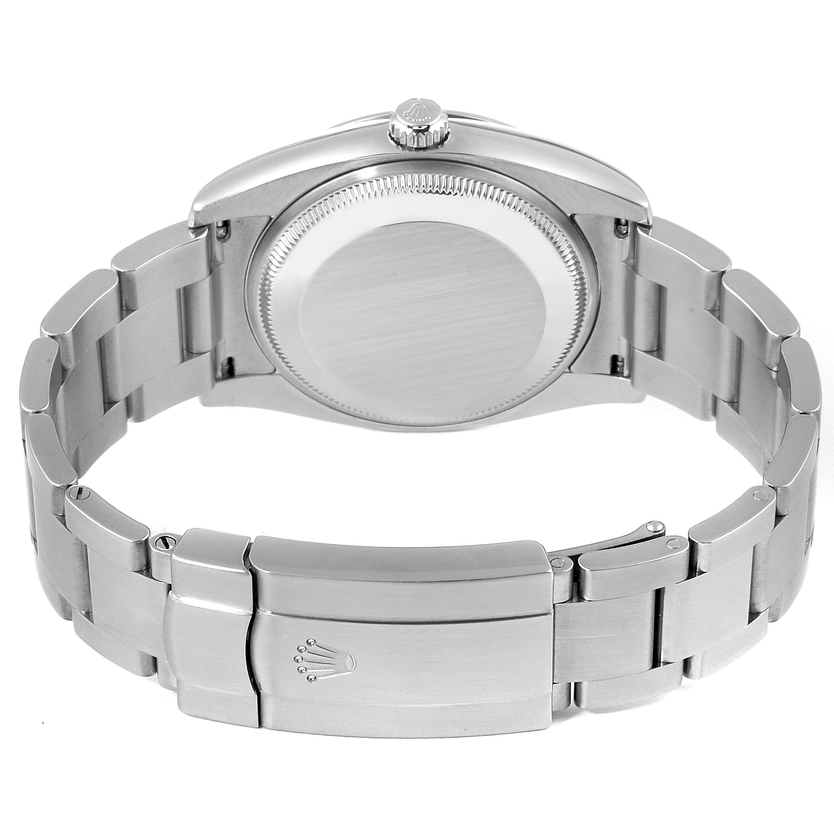 This image shows the back of the Rolex Air-King 114200 Men's Stainless Steel Silver Dial 114200 Men's Stainless Steel Silver Dial watch, highlighting its case back and bracelet clasp.