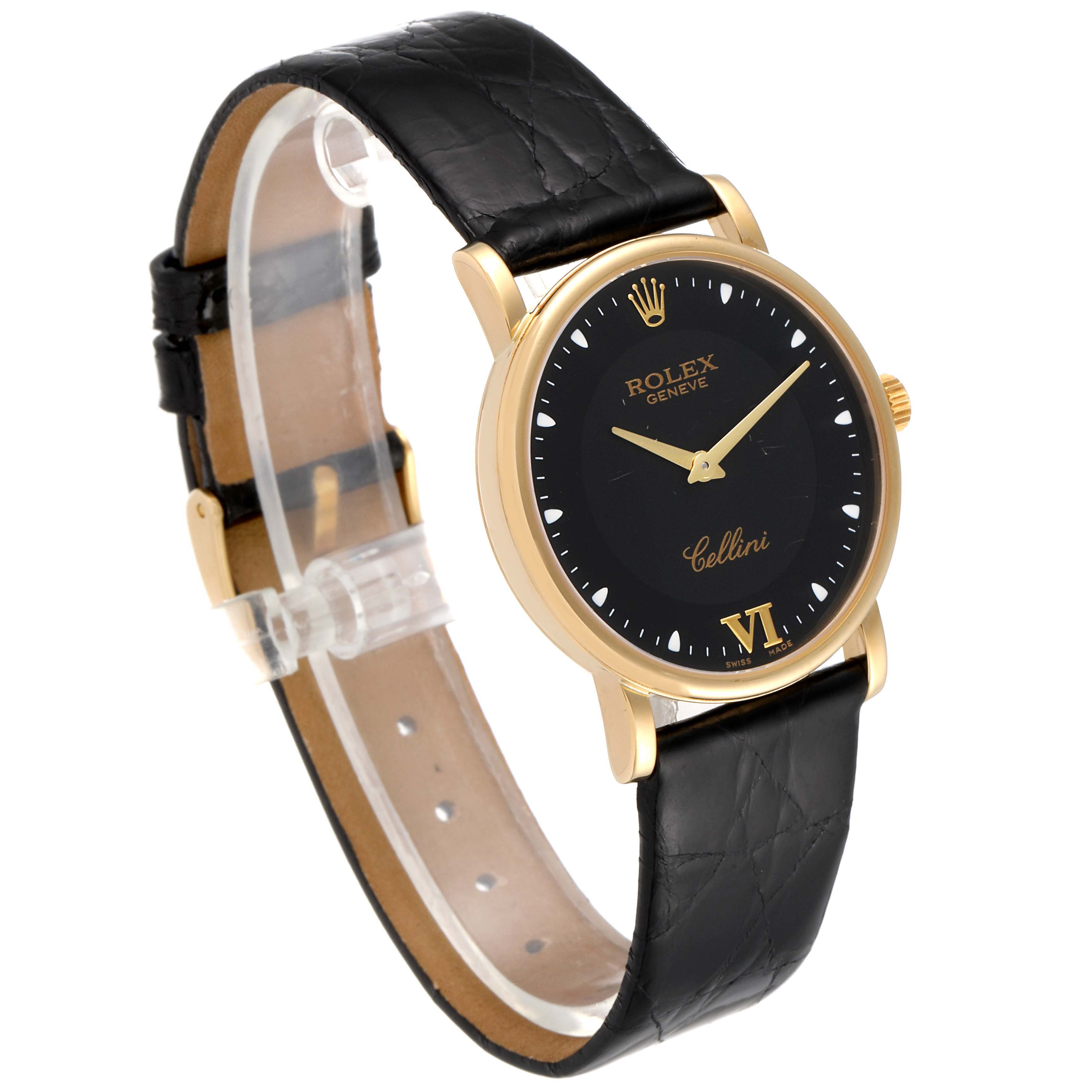 The image shows a side angle of a Rolex Cellini 5115 Men's Yellow Gold Black Dial 5115 Men's Yellow Gold Black Dial watch highlighting its black dial, gold case, and black leather strap.