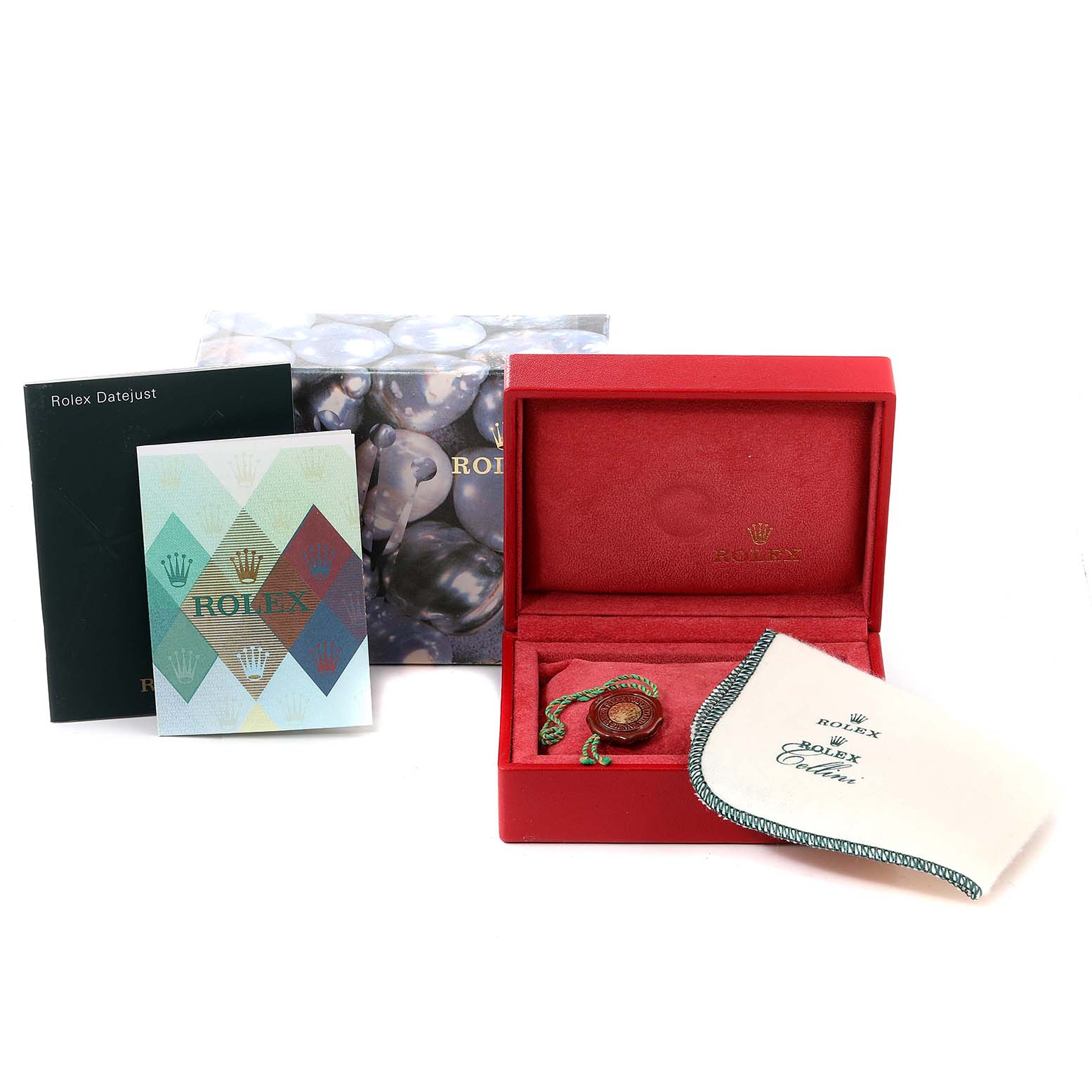 The image shows watch accessories and packaging for a Rolex Datejust 79173 Women
s Steel and Gold (two tone) Grey Dial 79173 Women
s Steel and Gold (two tone) Grey Dial, including a red box, manuals, and a cleaning cloth.