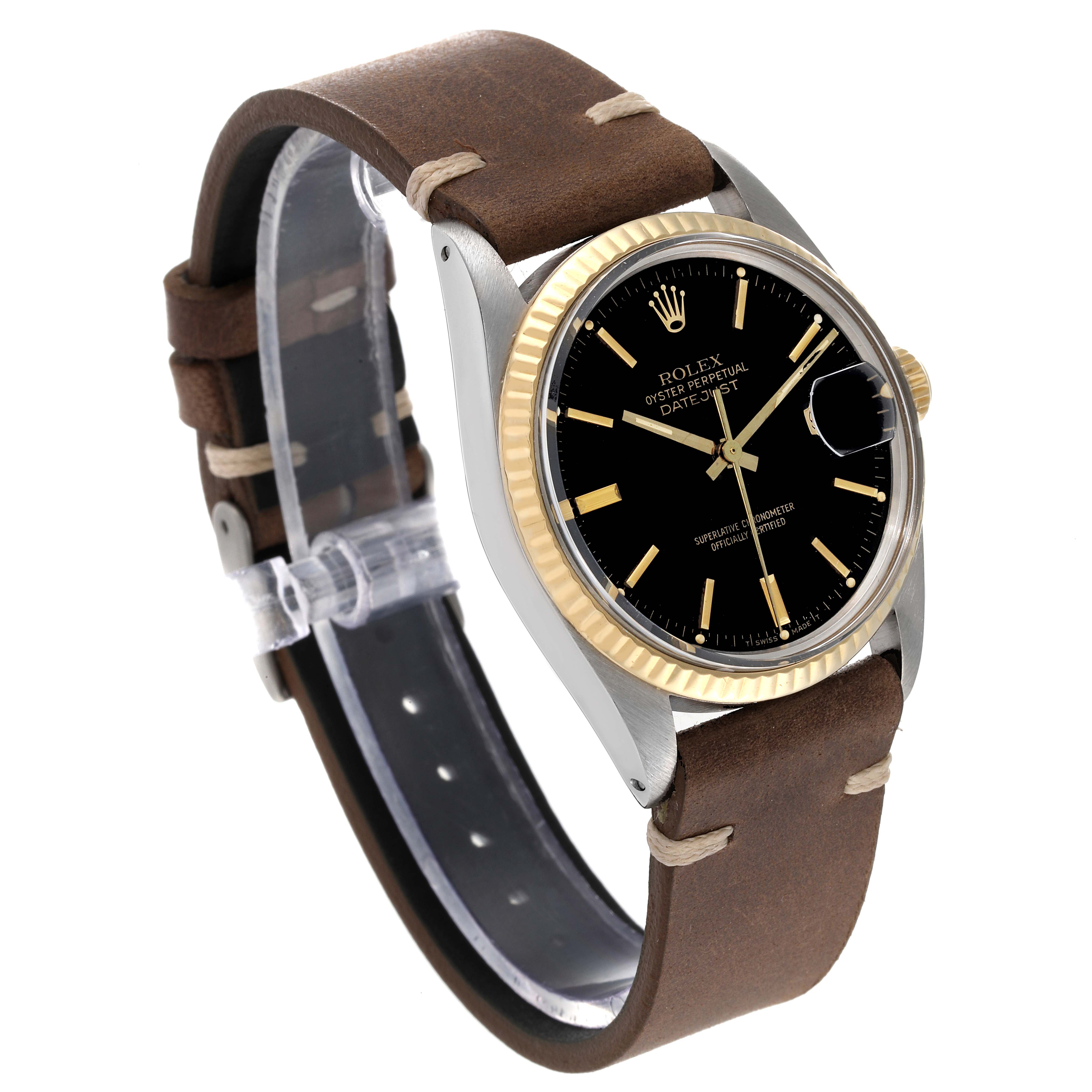 The photo shows a side angle of the Rolex Vintage Collection 16013 Men's Steel and Gold (two tone) Black Dial 16013 Men's Steel and Gold (two tone) Black Dial watch, featuring a black dial, gold bezel, and brown leather strap.