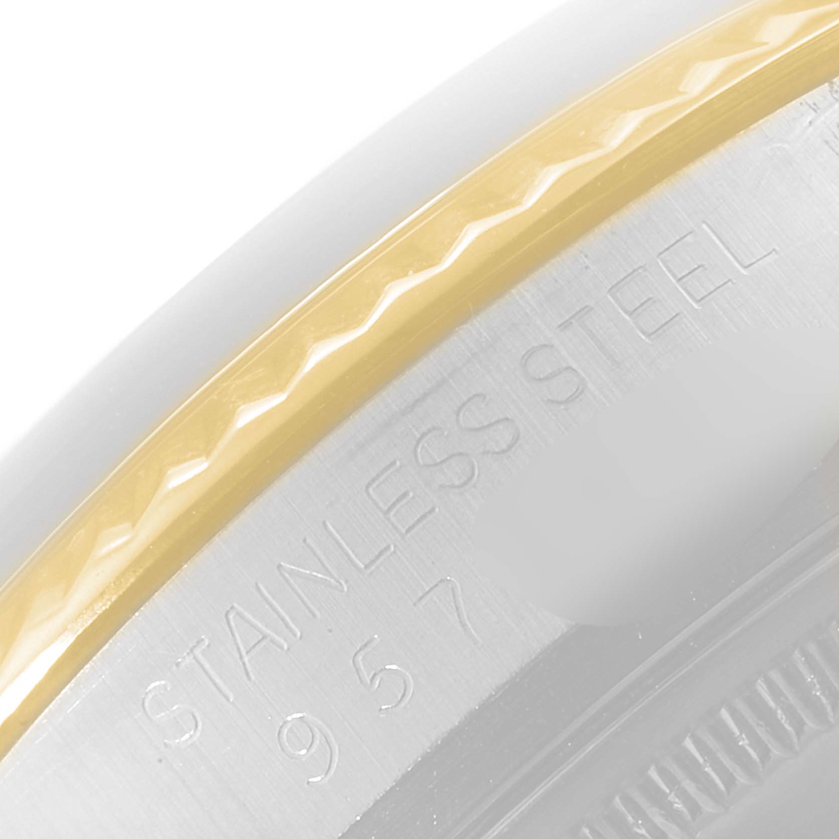 This is a close-up of the stainless steel and gold bezel of the Rolex Vintage Collection 16013 Men's Steel and Gold (two tone) Black Dial 16013 Men's Steel and Gold (two tone) Black Dial model.