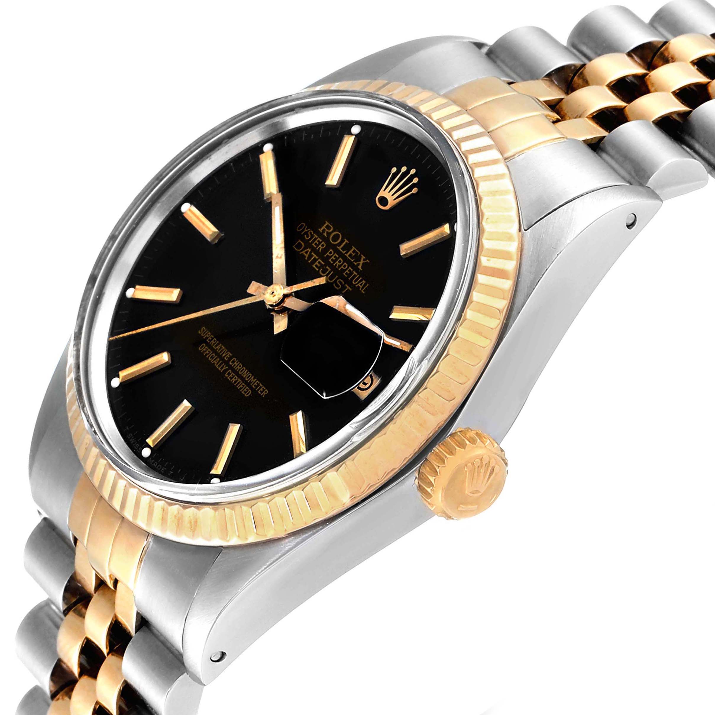 The Rolex Vintage Collection 16013 Men's Steel and Gold (two tone) Black Dial 16013 Men's Steel and Gold (two tone) Black Dial model is shown from a close-up side angle, displaying its black dial, fluted bezel, crown, and Jubilee bracelet.