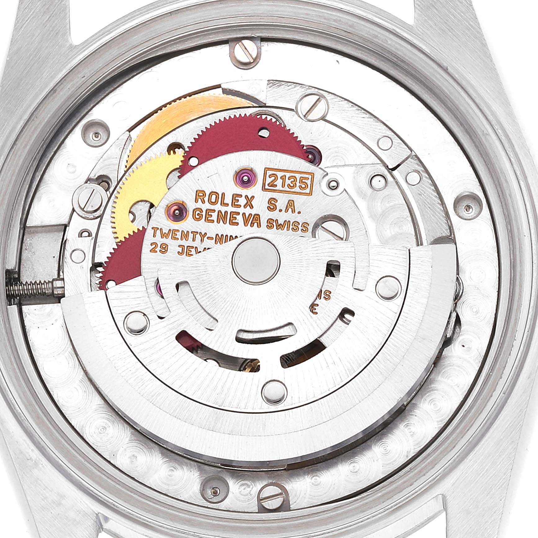 This image shows the internal mechanism of a Mid-Size Rolex watch, highlighting the gears and movement components from the back.