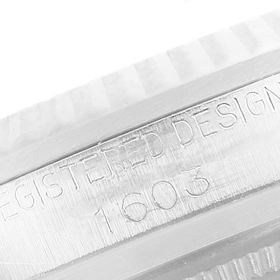 The image shows a close-up of the case engraving on a Vintage Collection Rolex watch, displaying the "REGISTERED DESIGN 1603" markings.