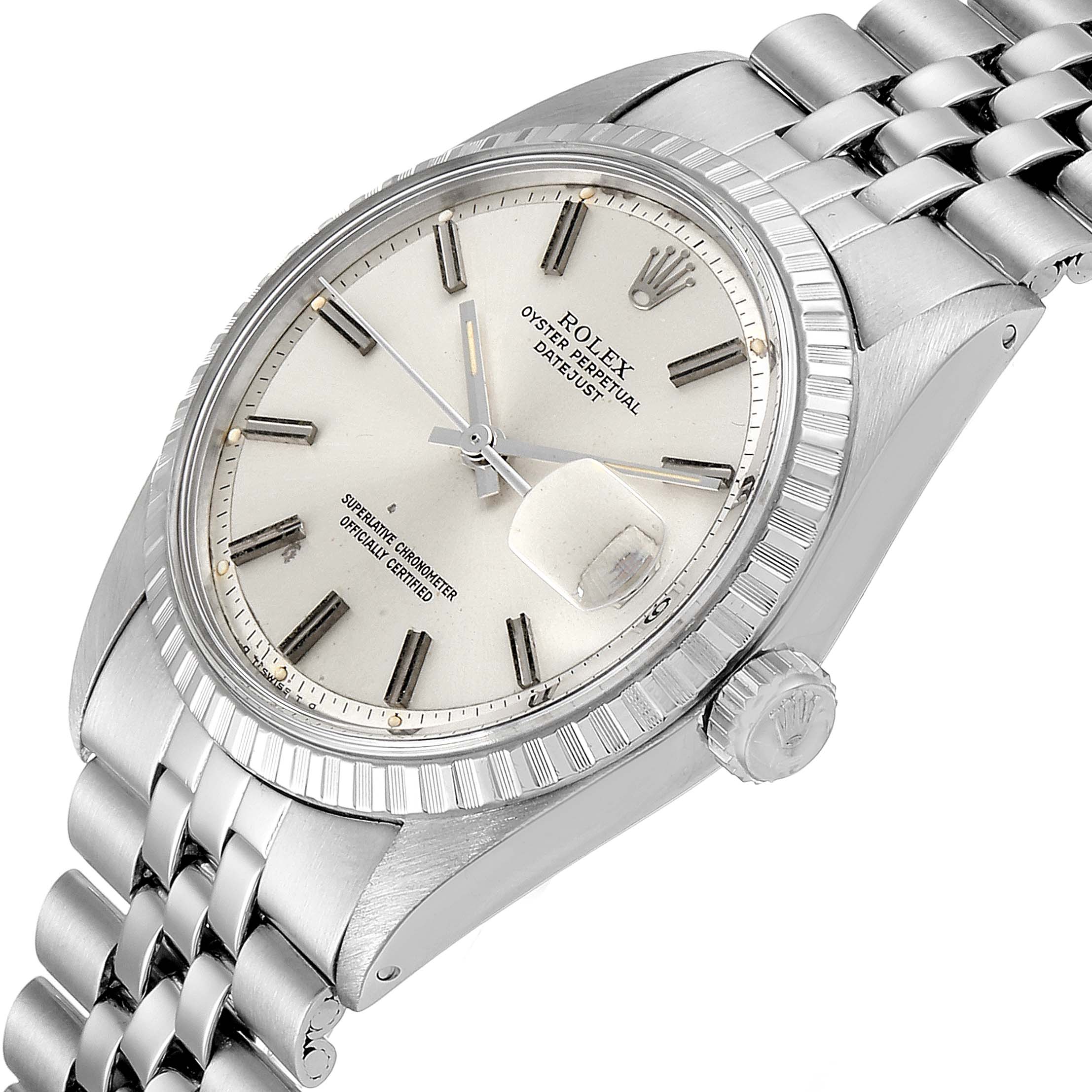 The image shows a Rolex Vintage Collection 1603 Men
s Stainless Steel Silver Dial 1603 Men
s Stainless Steel Silver Dial Datejust watch at an angled view, showcasing its dial, bracelet, and crown.